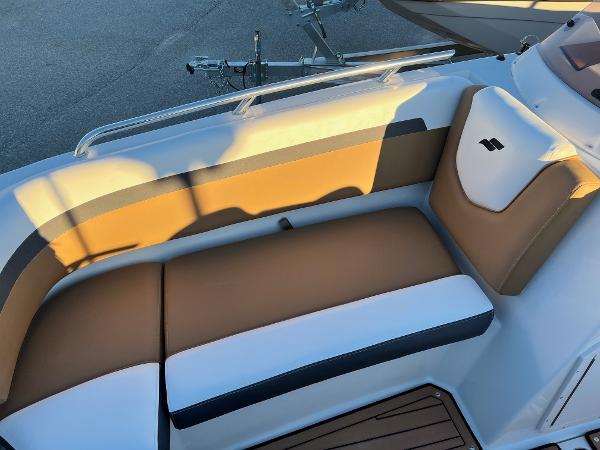 2024 Starcraft SVX 191 boat interior seating with tan and white upholstery.