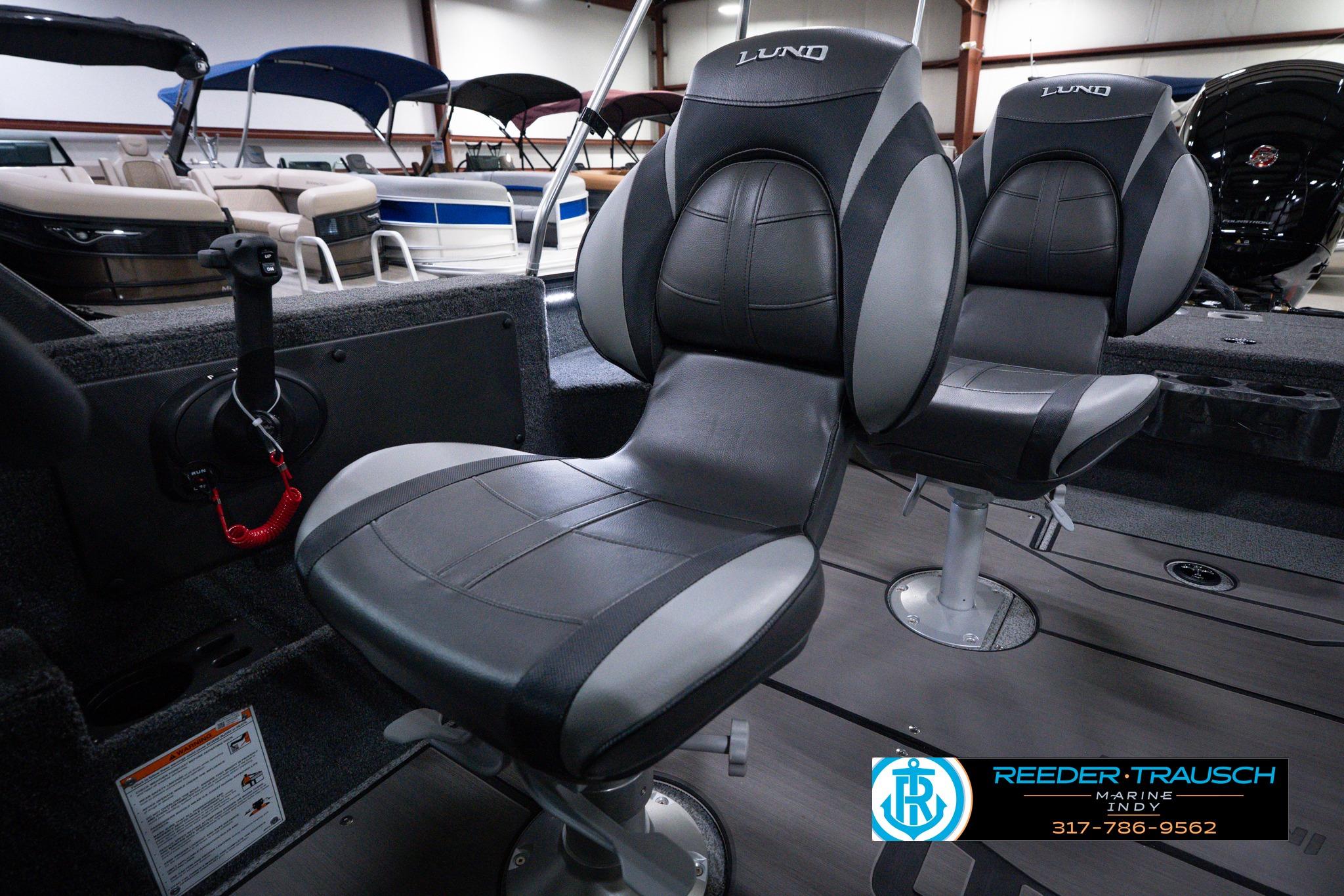 2026 Lund 1875 Impact XS SS boat interior with comfortable seating and modern design.