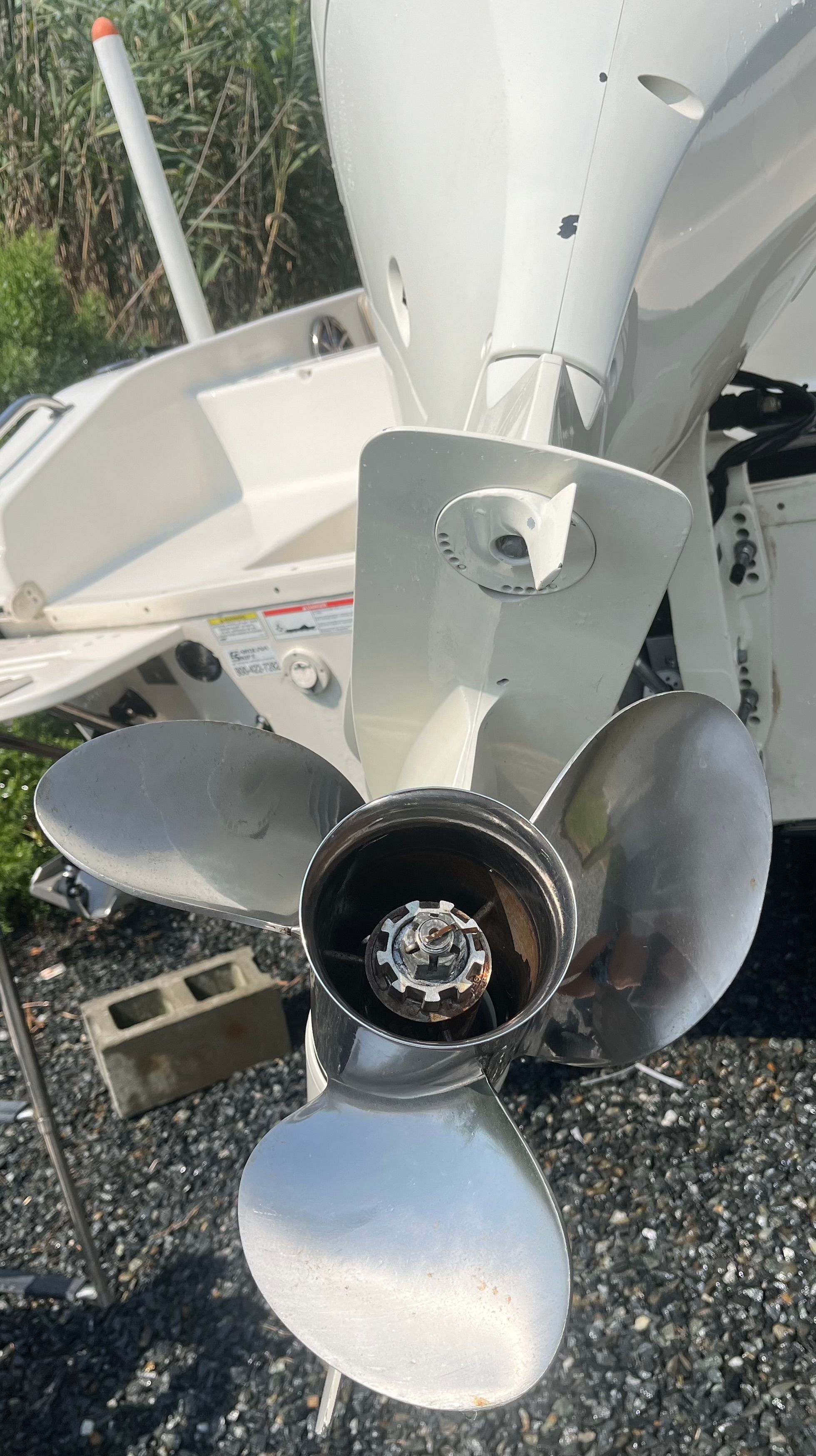 Close-up of a 2014 Carolina Skiff 23 Ultra Elite boat propeller.