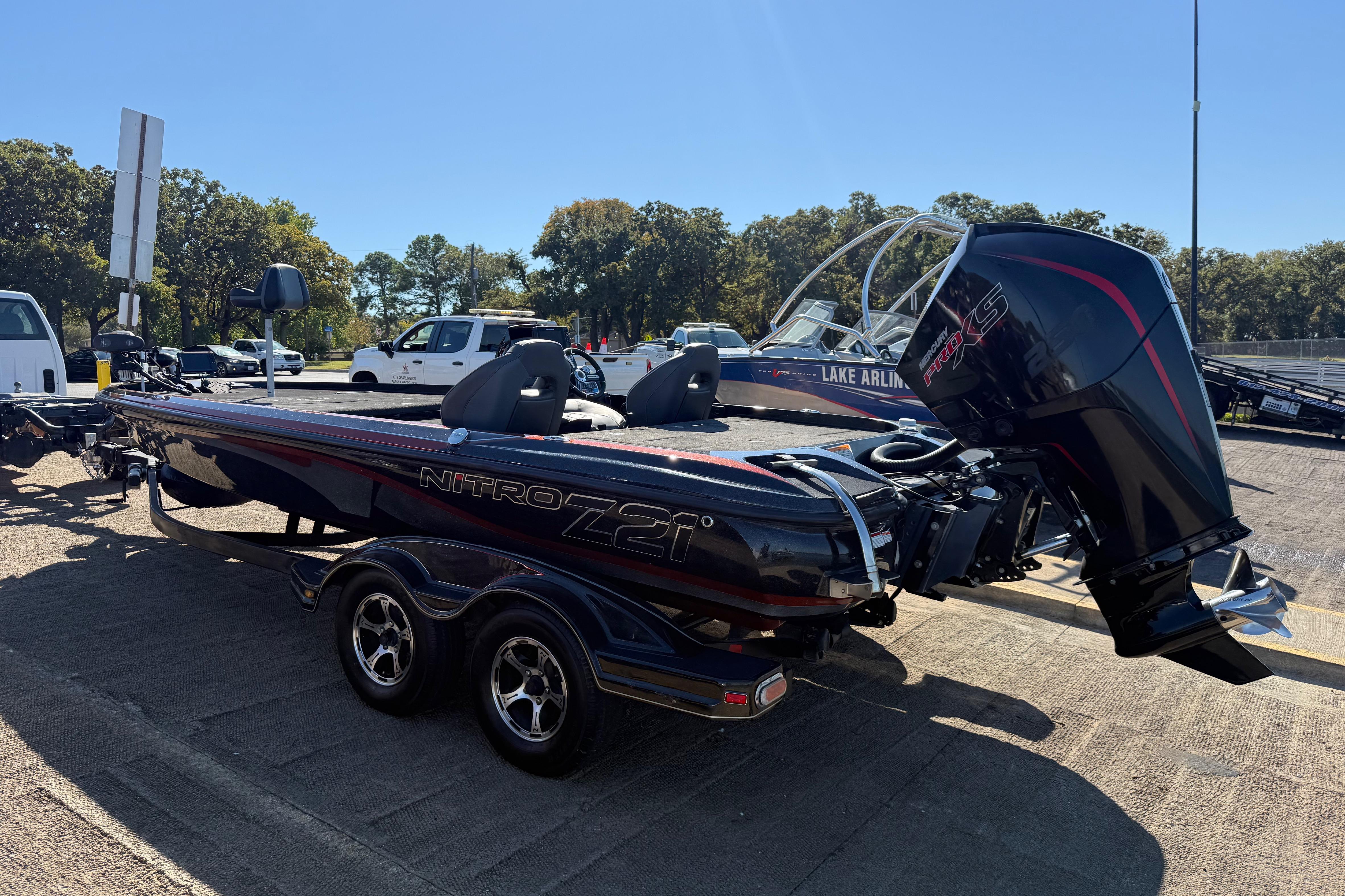 2019 Nitro Z21 Pro boat with powerful engine, parked outdoors on a sunny day.