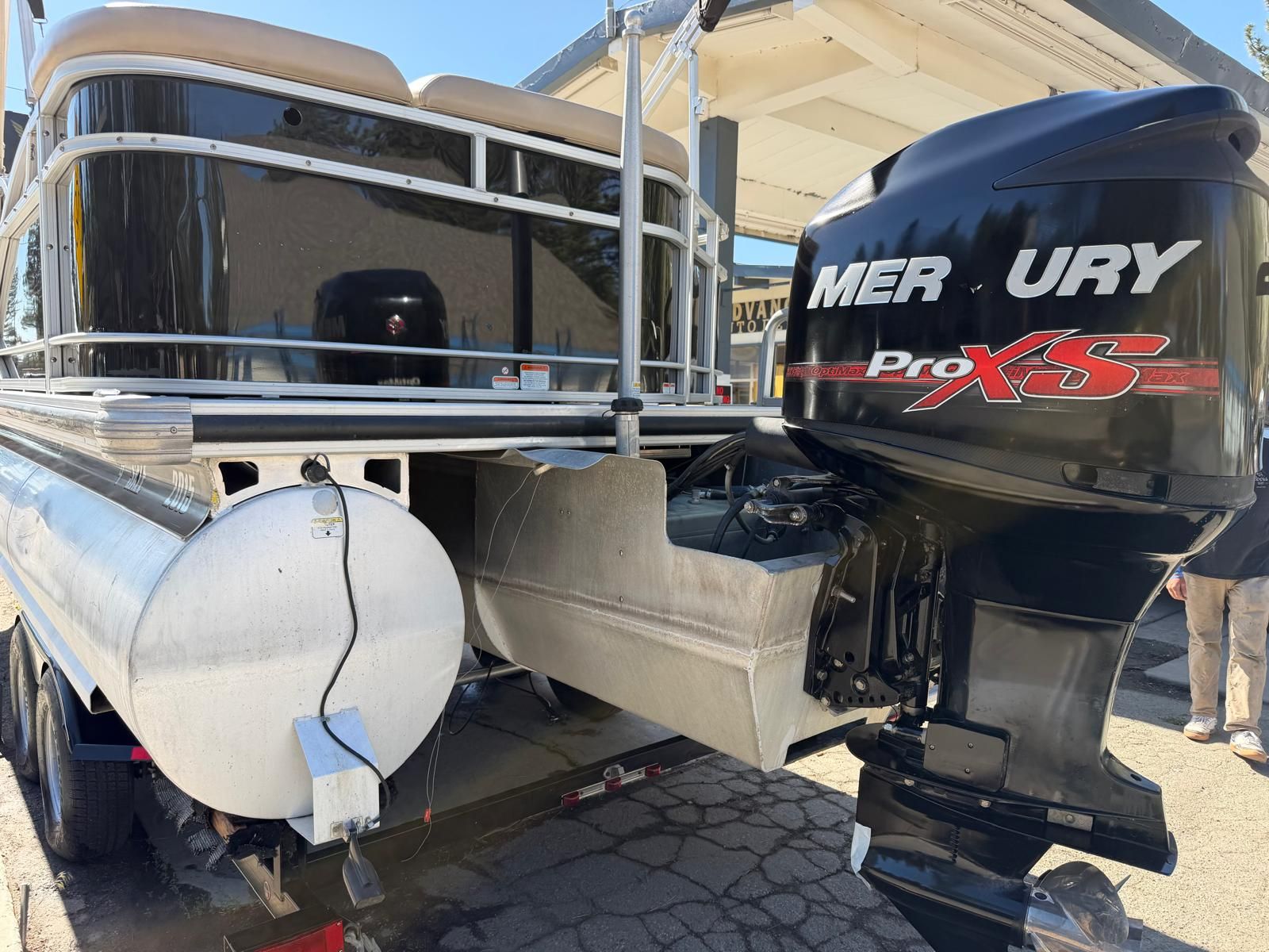 2015 Regency 220DL3 pontoon boat with Mercury Pro XS engine.