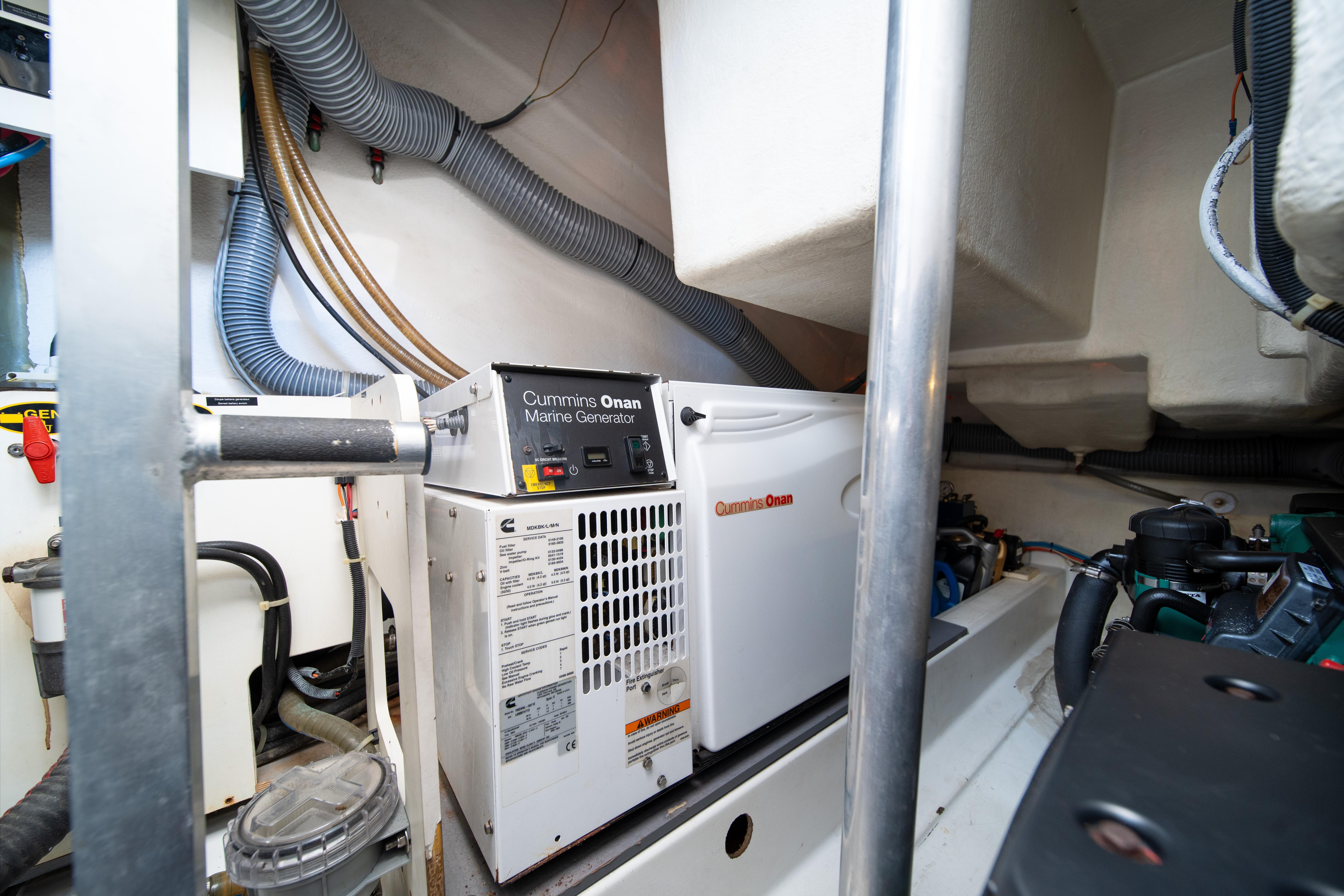 Engine room of 2010 Beneteau Monte Carlo 47 with Cummins Onan marine generator.