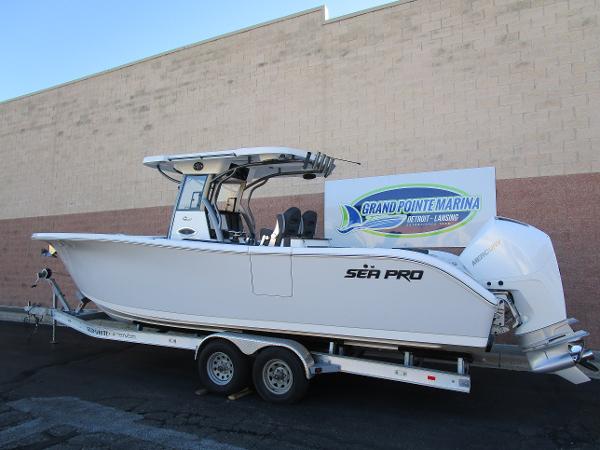 2025 Sea Pro 292 Offshore boat on trailer at Grand Pointe Marina.