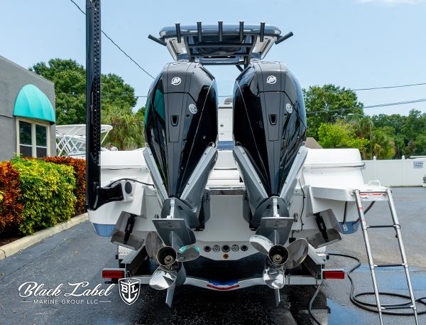 2025 Caymas 281 HB boat with dual outboard motors, displayed at Black Label Marine Group.