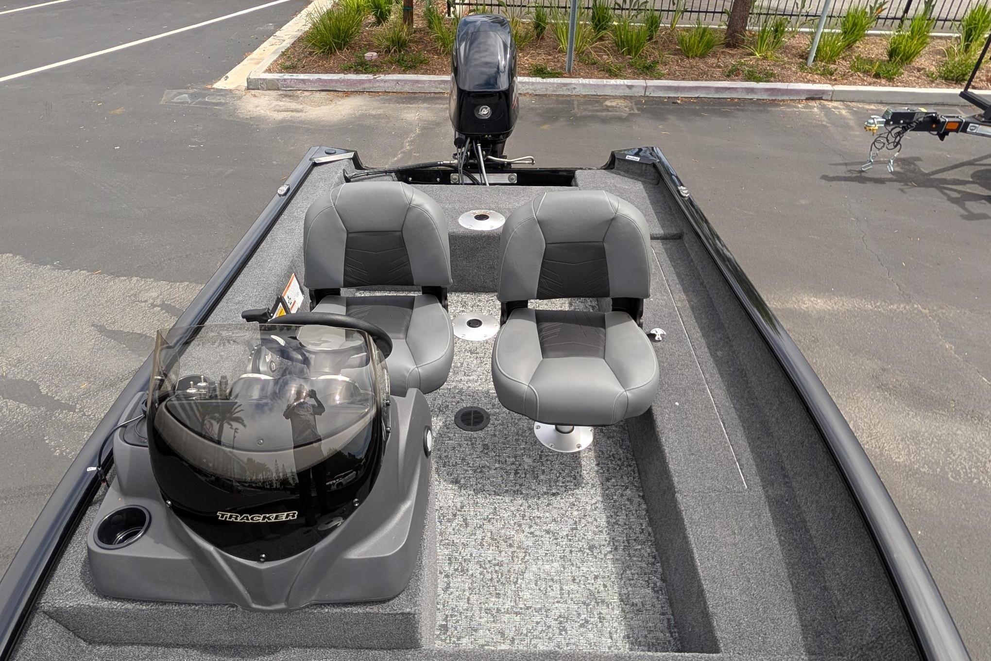 2026 Tracker Super Guide V-16 SC boat interior with dual seats and steering console.