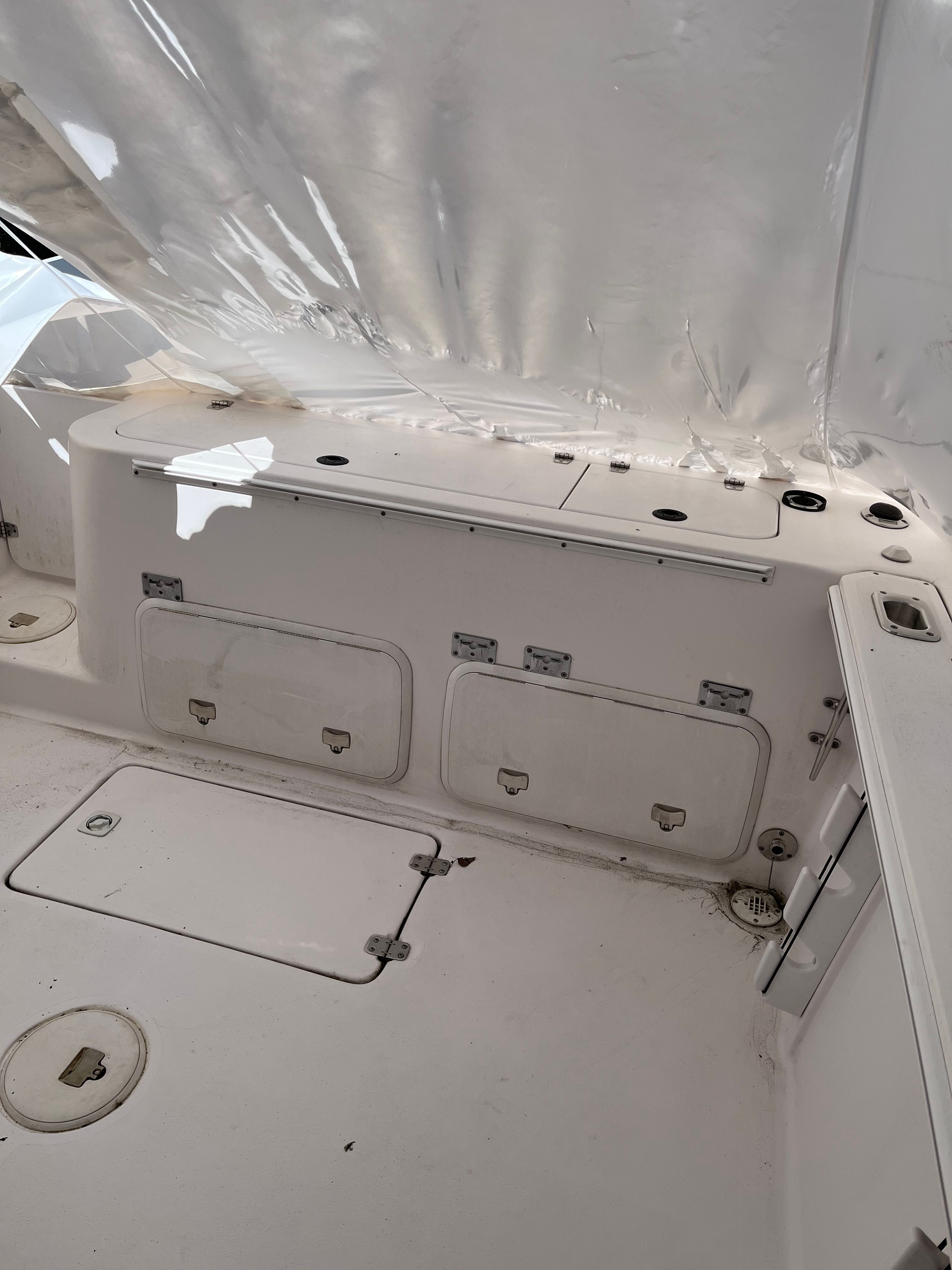 The image shows the deck of a 2002 Pro-Line Center Console boat.