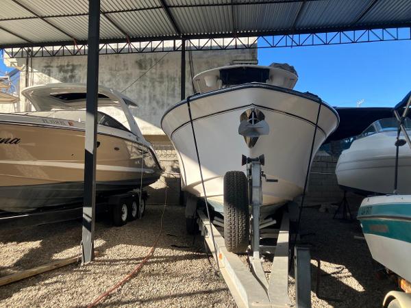 2006 Grady-White Bimini 306 boat on trailer in covered storage.