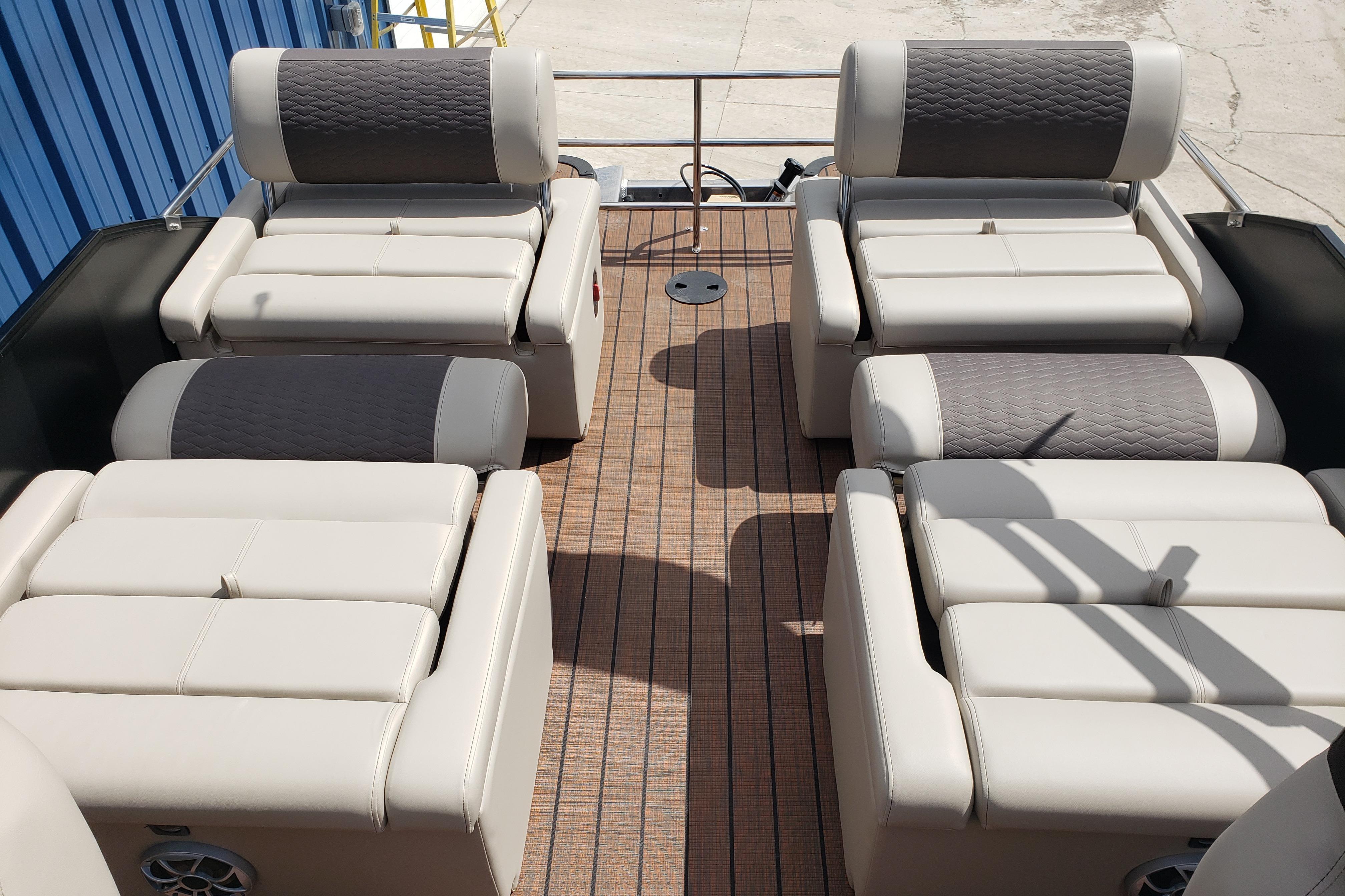 Luxurious seating on 2026 Bentley Pontoons Elite 253 QSB with elegant upholstery.