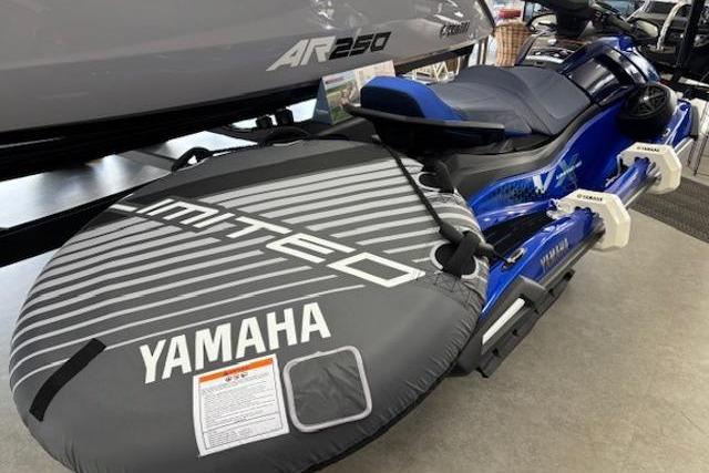 2026 Yamaha WaveRunner VX Limited HO with inflatable tube accessory, displayed indoors.