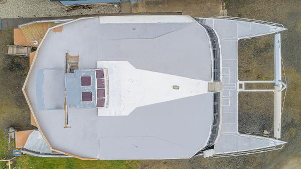 Aerial view of 2025 Catamaran Bloomfield 86 Motorsailor, showcasing deck layout and design.