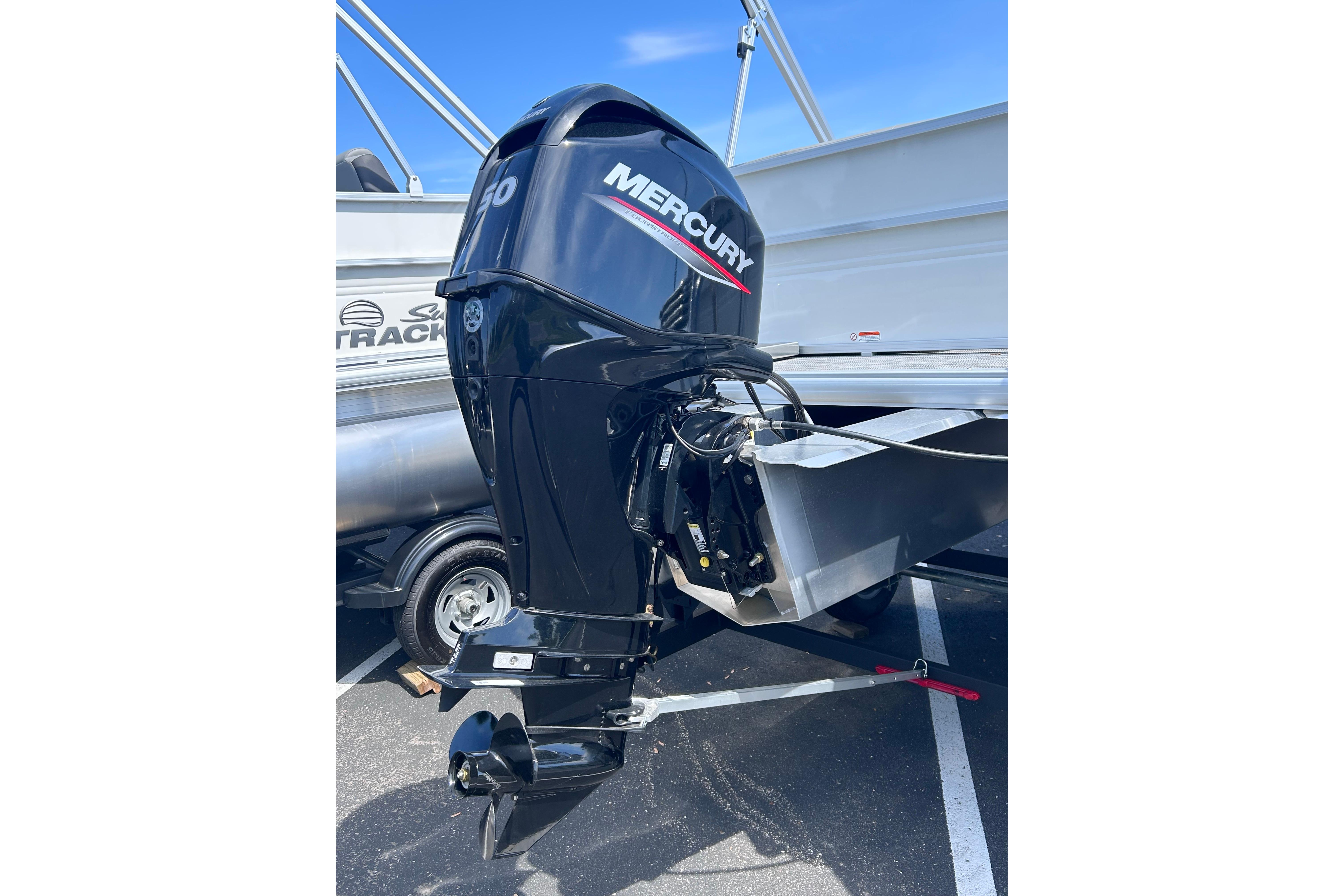 2026 Sun Tracker Party Barge 16 DLX with Mercury outboard motor.