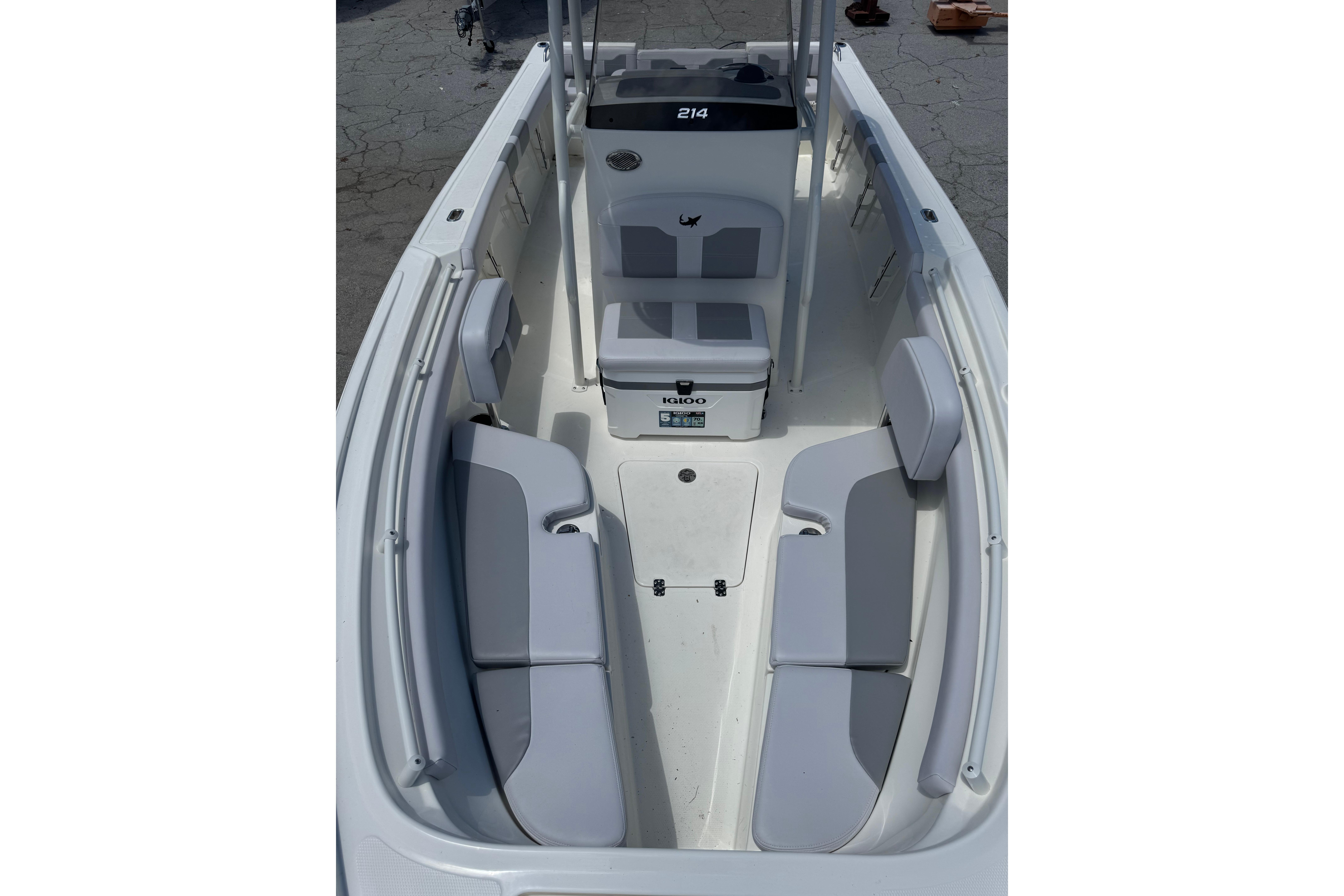 2026 Mako 214 Center Console boat interior with seating and console view.