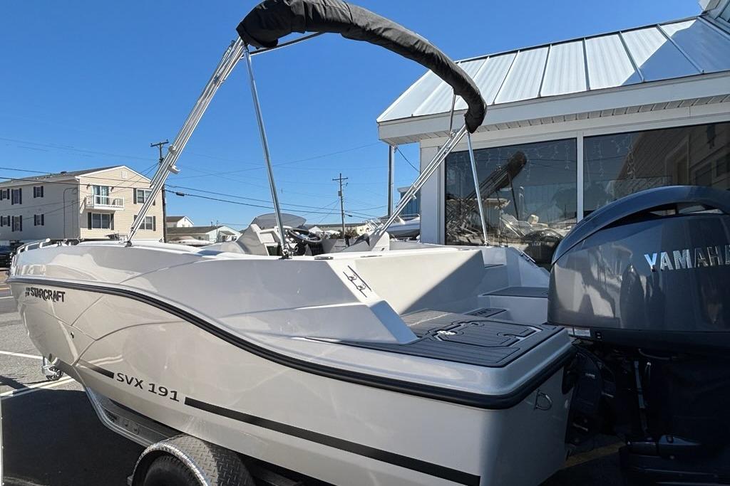 2026 Starcraft SVX 191 OB boat with Yamaha engine, parked outdoors.