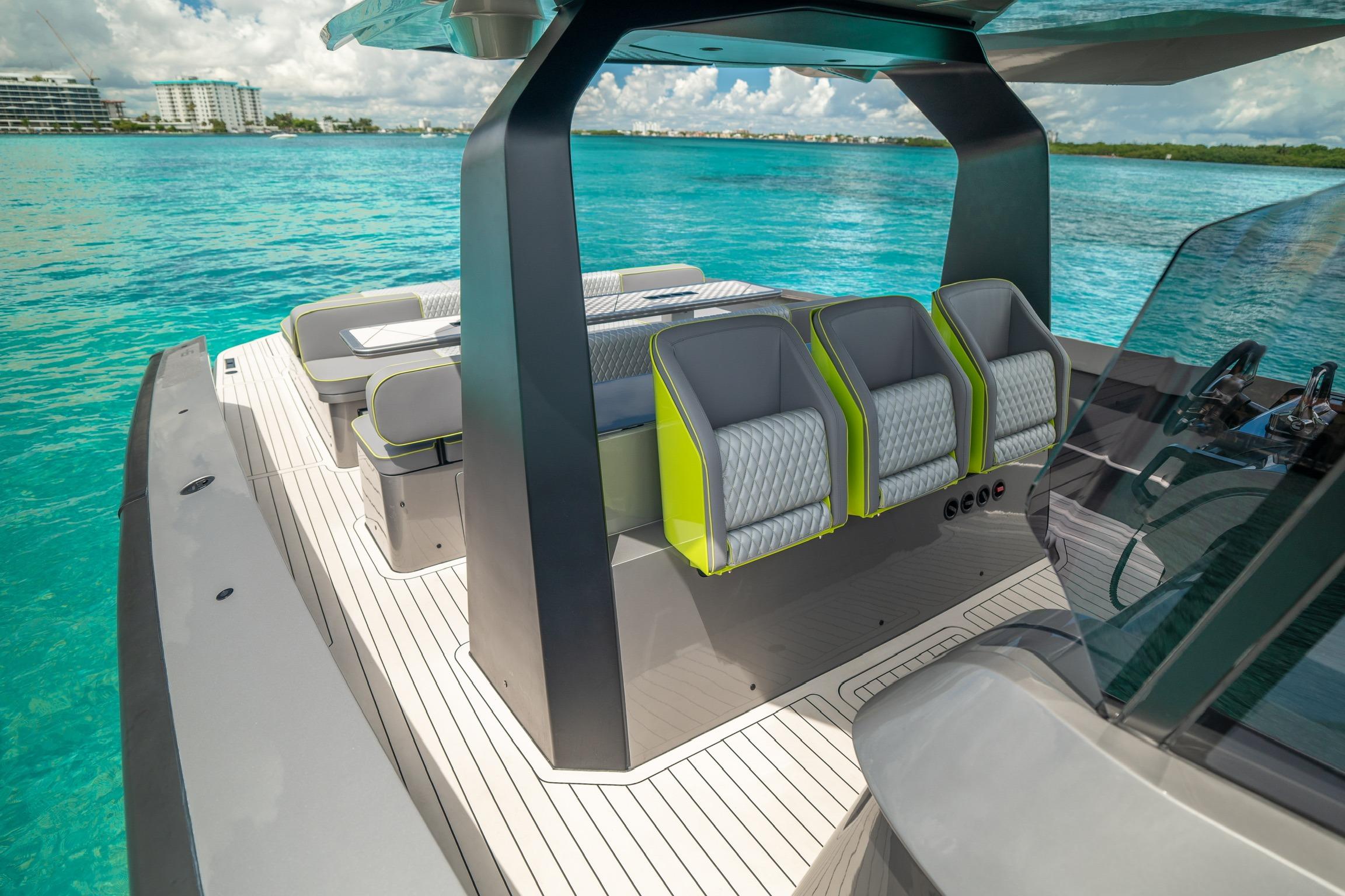 Luxurious 2024 Maori 46ft yacht with modern seating on turquoise waters.