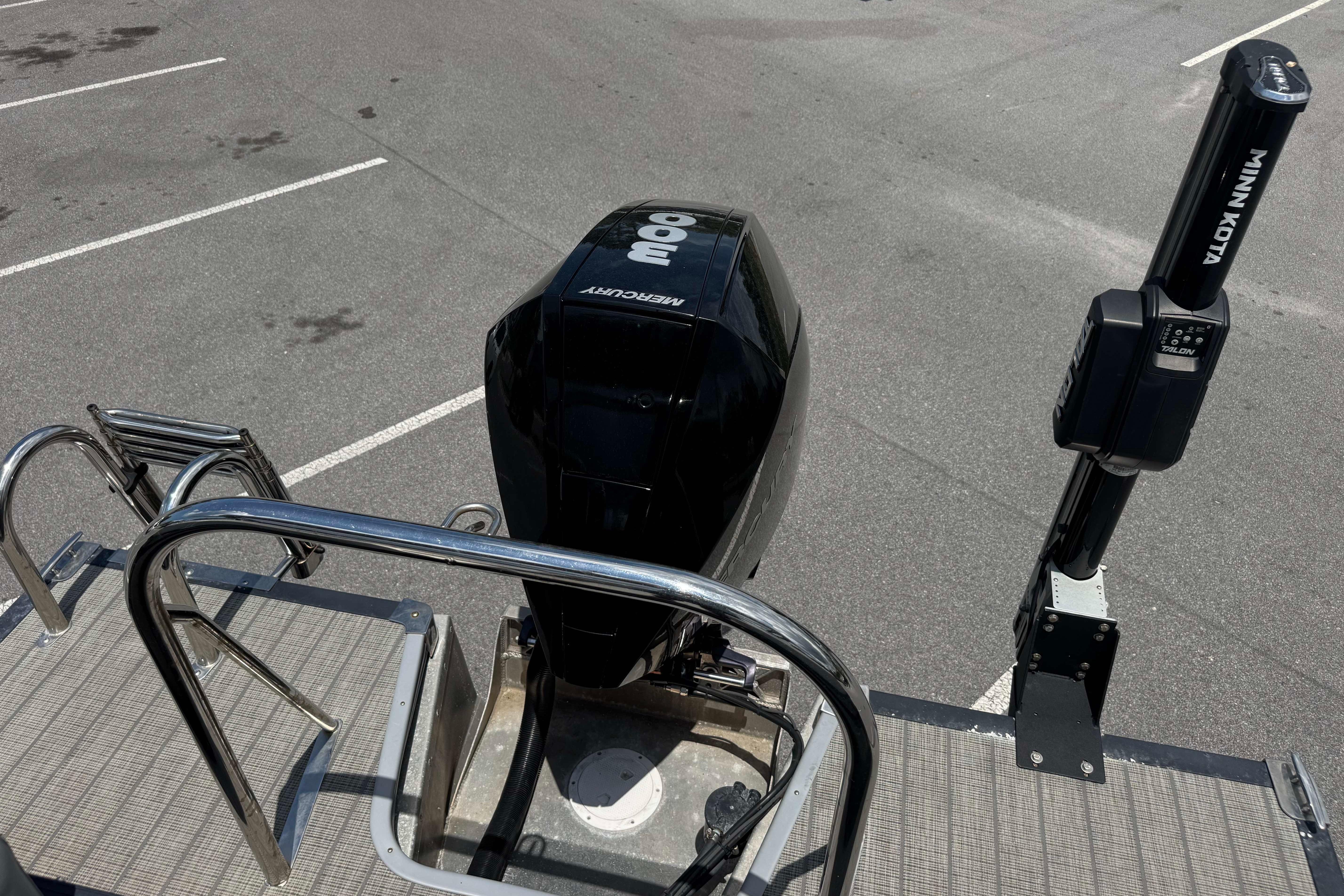 2022 Manitou 25 Encore boat with Mercury engine and Minn Kota trolling motor.