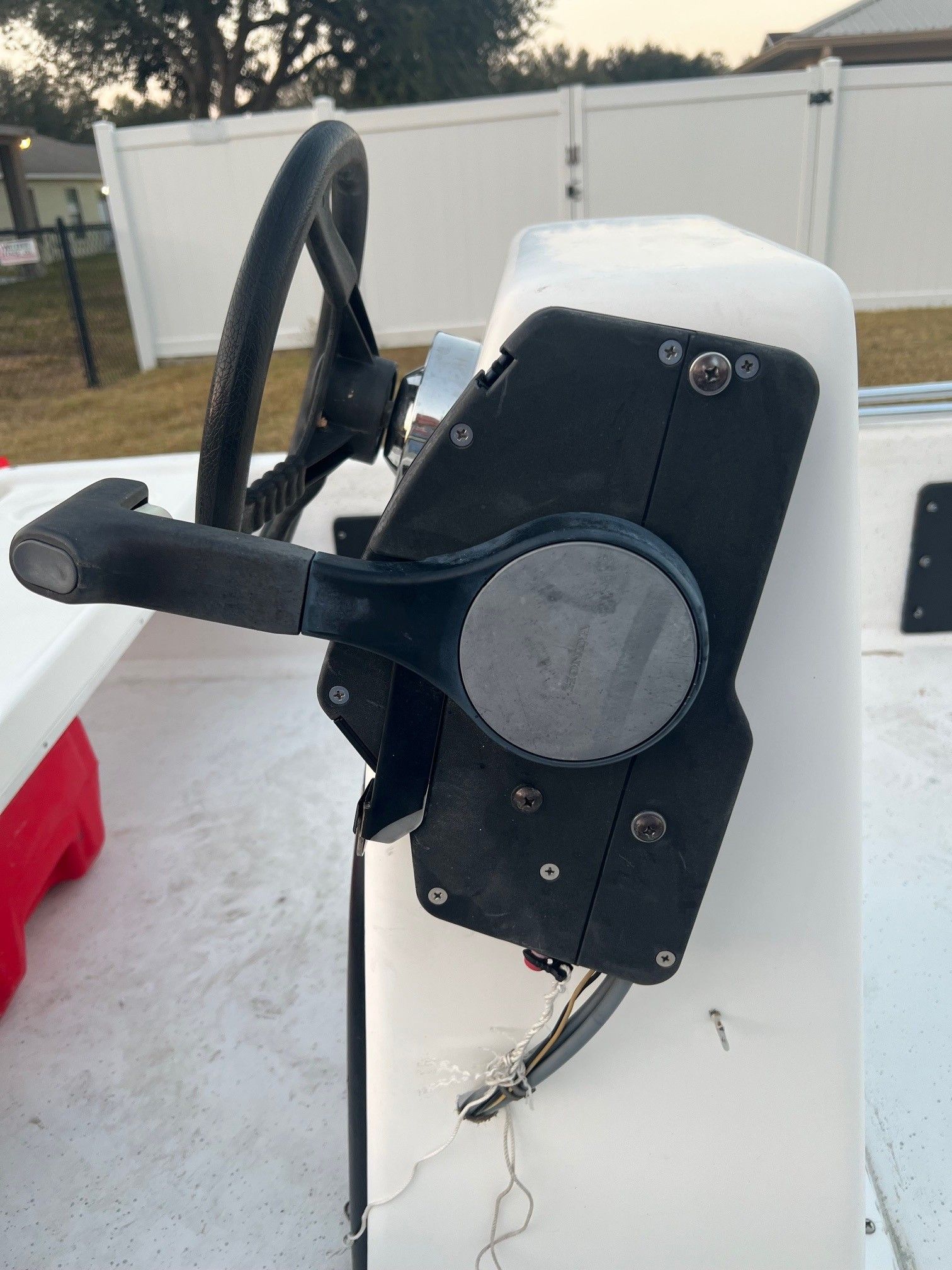 2007 Carolina Skiff JV15 steering console with wheel and throttle lever.
