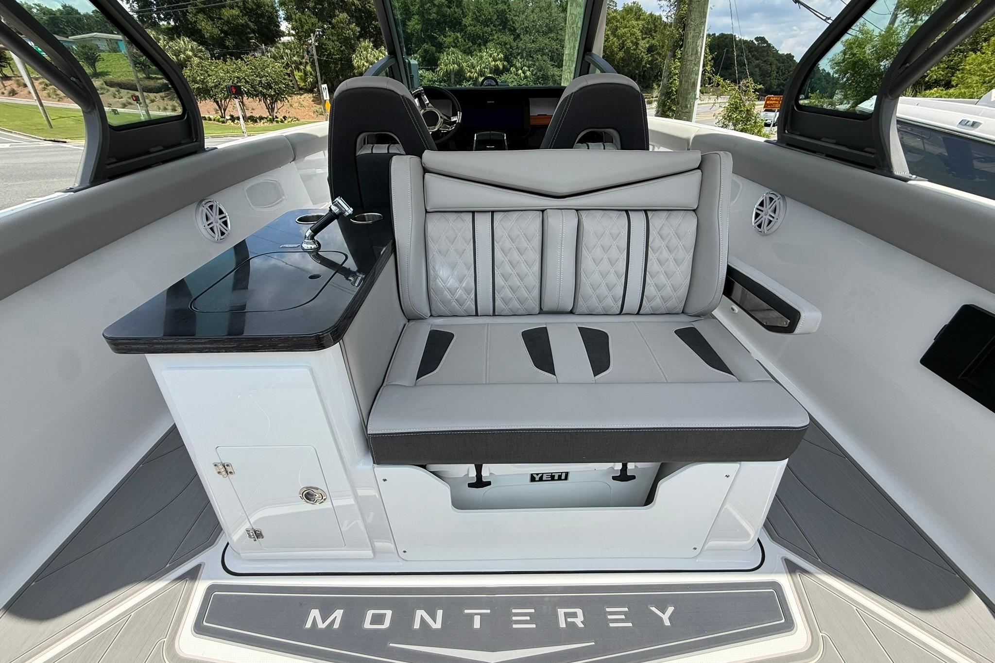2027 Monterey Elite 30 OB boat interior with luxurious seating and sleek design.