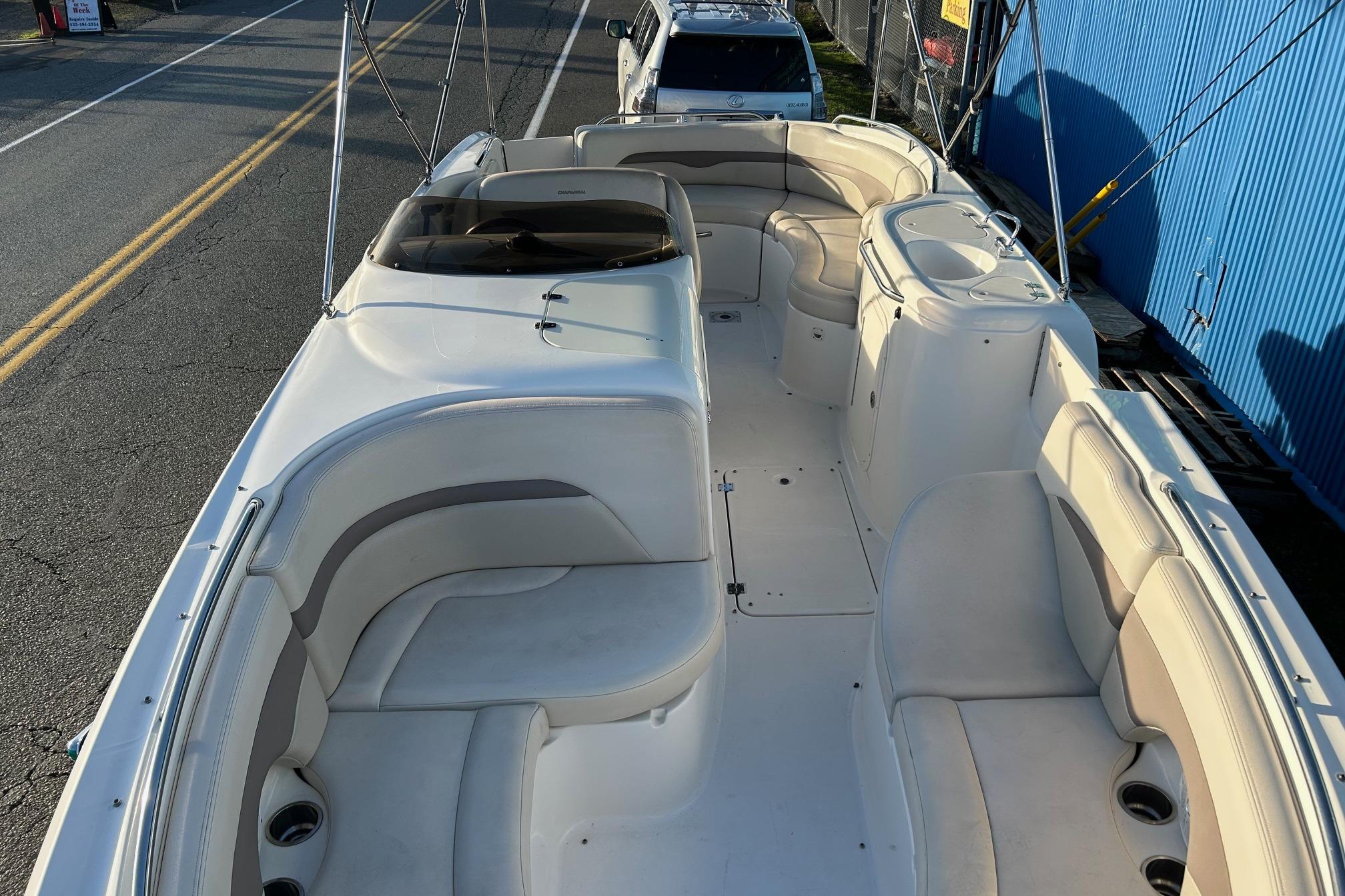 2005 Chaparral Sunesta 252 boat interior with spacious seating and sleek design.