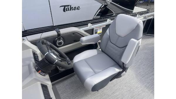 2025 Tahoe Pontoon LTZ Cruise captain's chair and steering console.