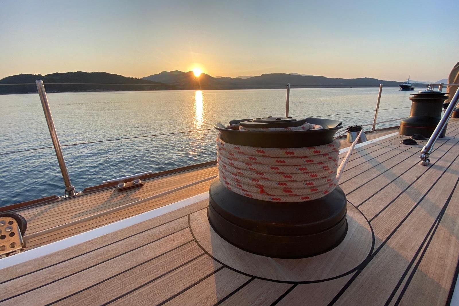 De Cesari Vallicelli 72 yacht deck at sunset, 1991 model, serene sea view.