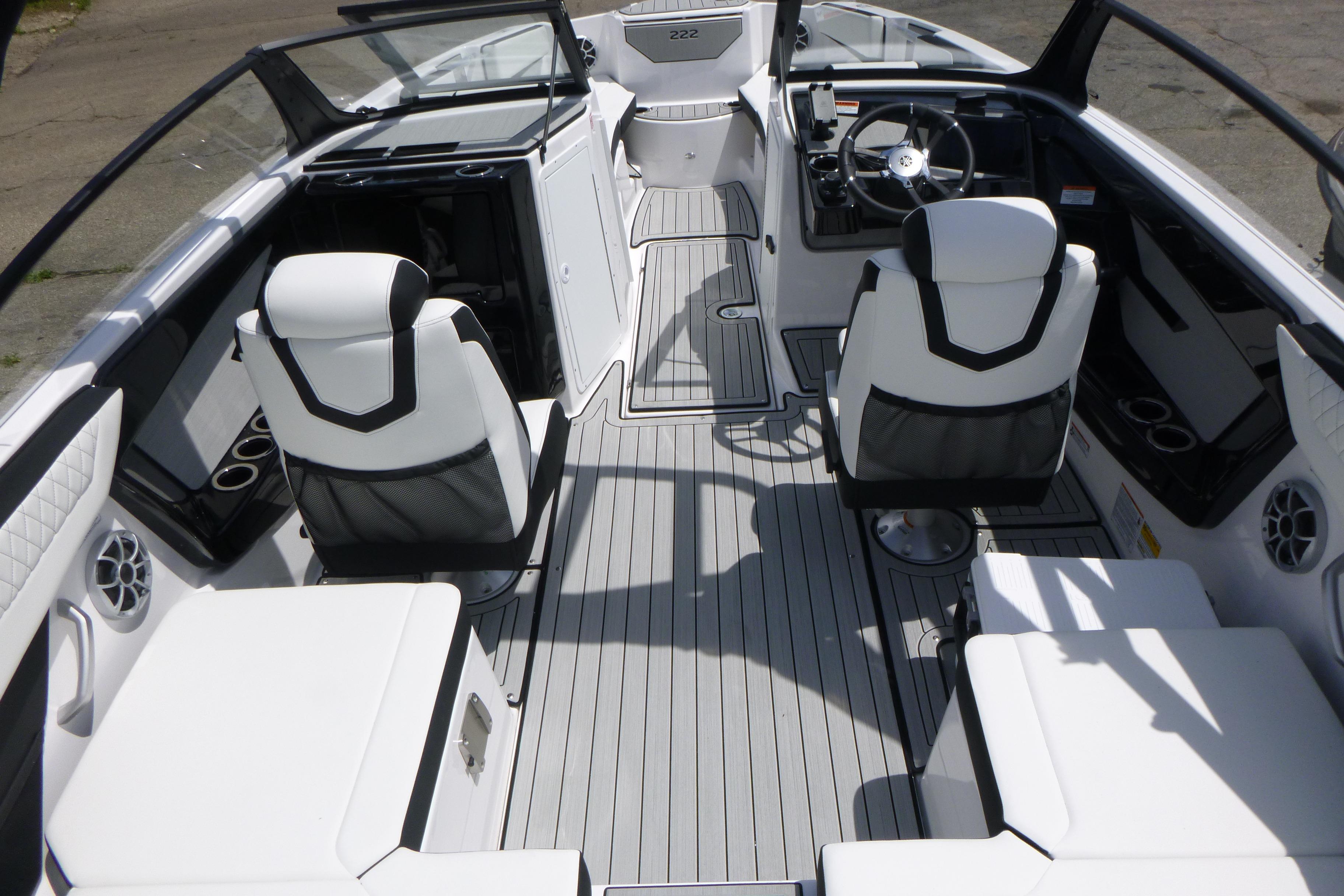 2026 Yamaha Boats 222S interior with sleek seating and modern dashboard design.