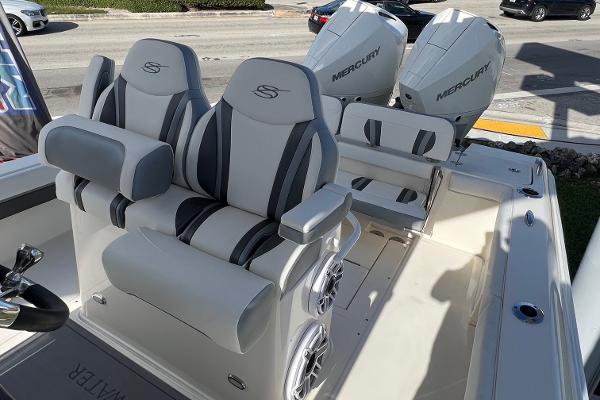 2024 ShearWater 270 SS Open Carolina boat with dual Mercury engines and stylish seating.