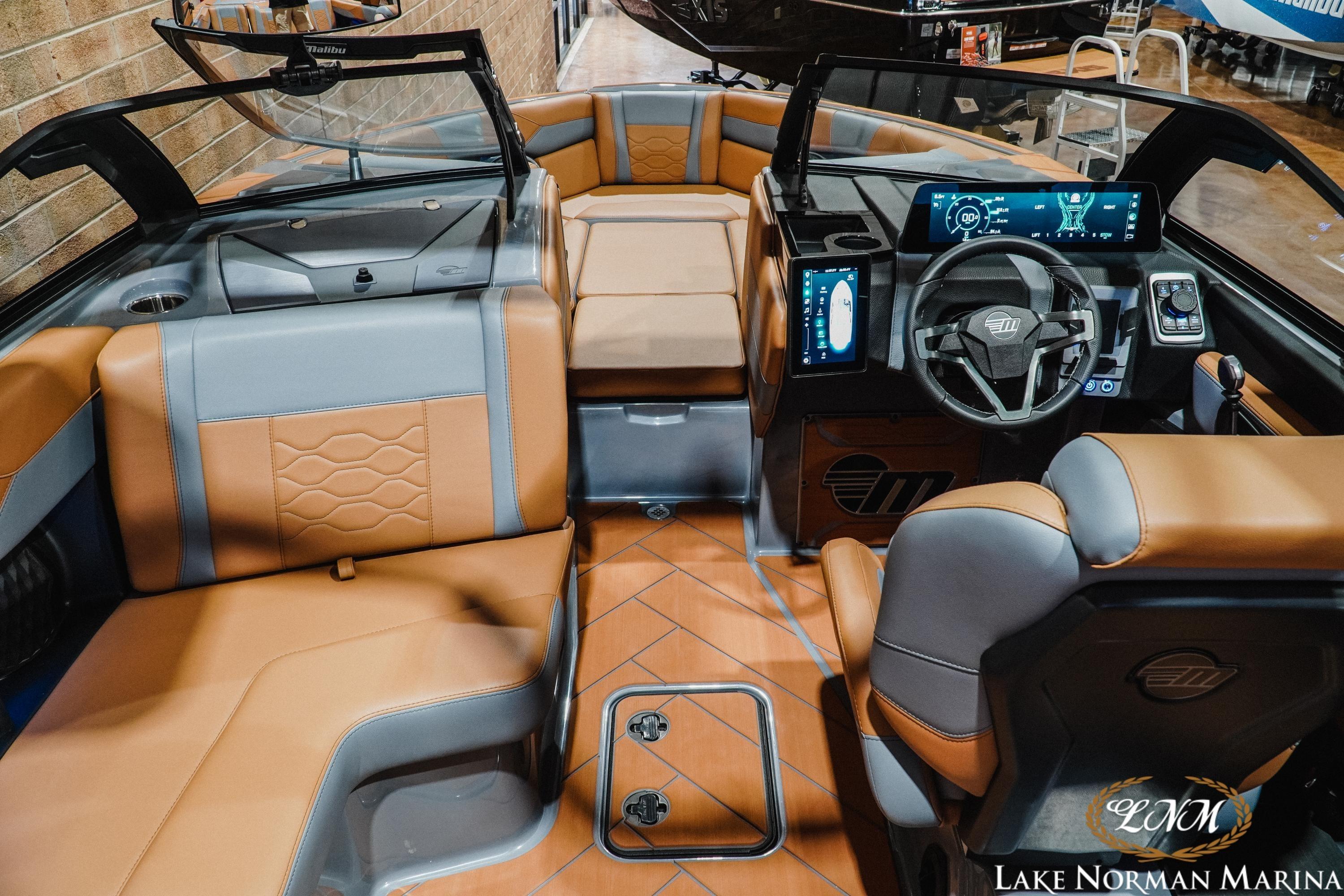 2026 Malibu Wakesetter 23 LSV interior with modern dashboard and luxurious seating.