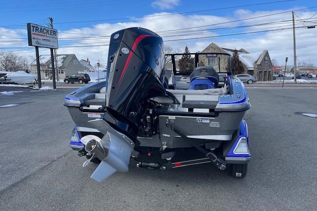 2026 Ranger 1880MS boat with powerful outboard motor in a parking lot.