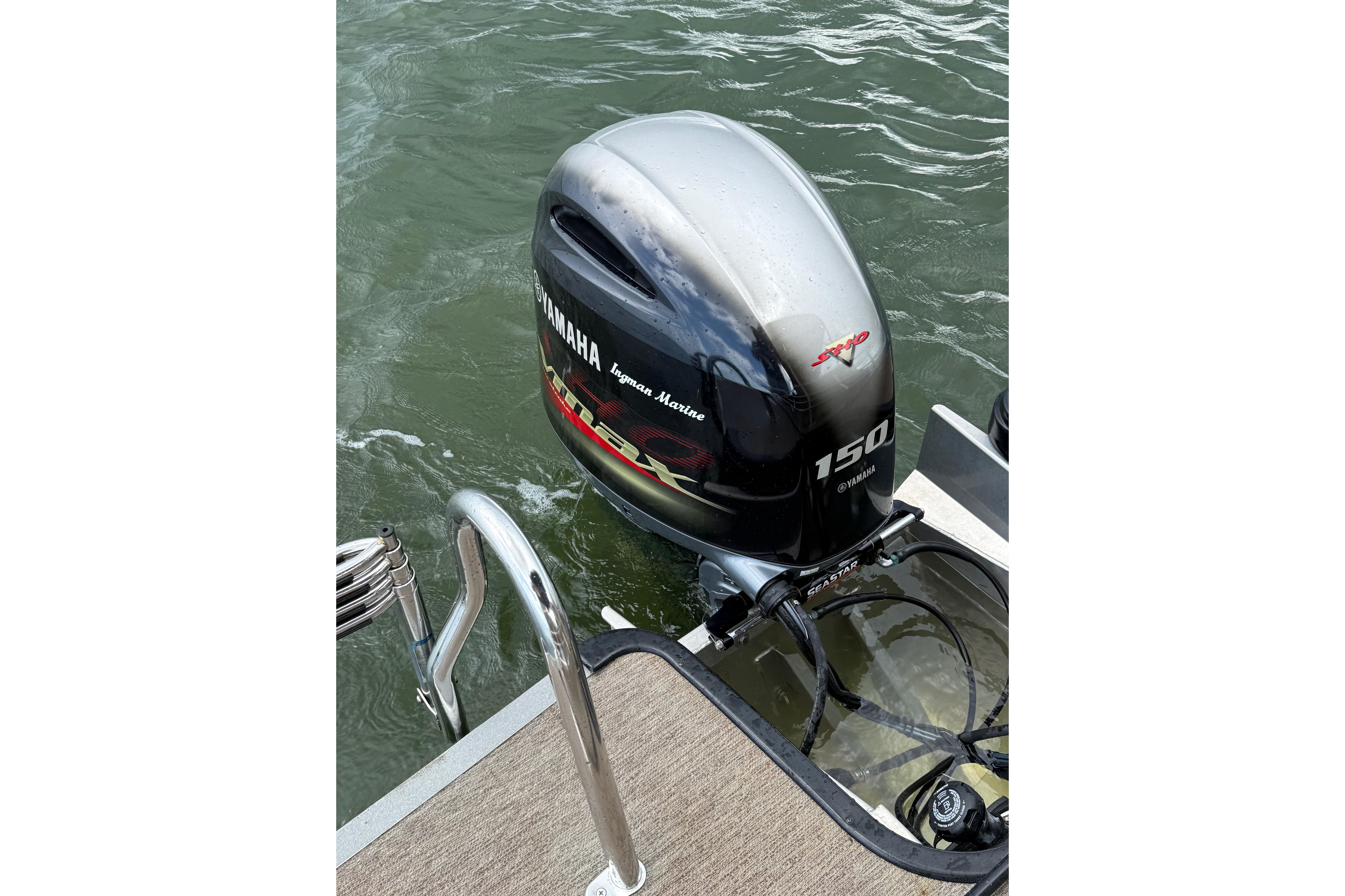2021 Sylvan L1 SPX with Yamaha 150 outboard motor on water.