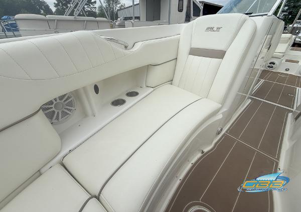 2008 Sea Ray 270 SLX boat interior with white leather seating and cup holders.