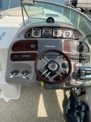 Cockpit dashboard of a 2008 Chaparral Signature 310 boat.