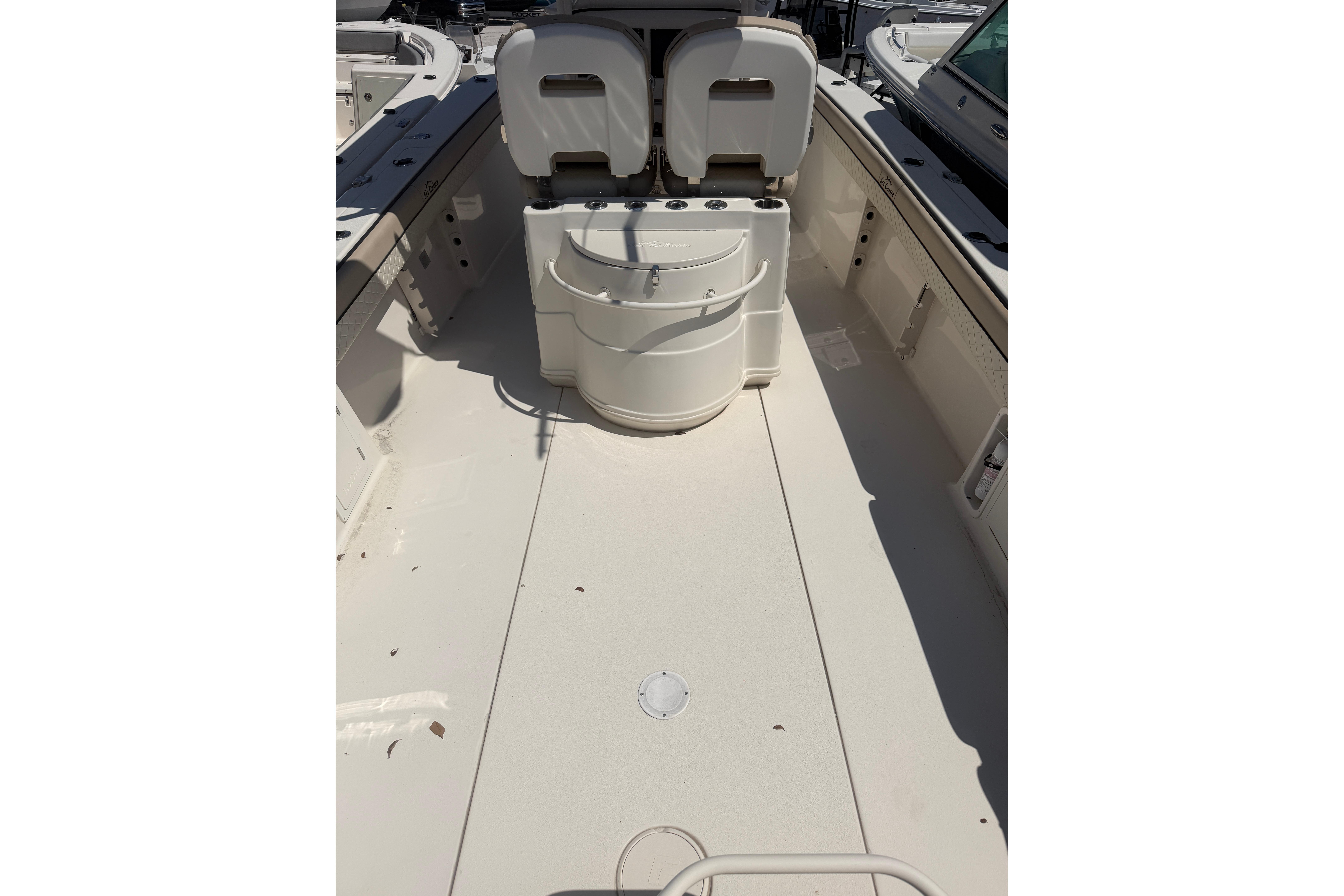 2021 Sea Chaser 30 HFC CC boat interior with seating and storage compartments.
