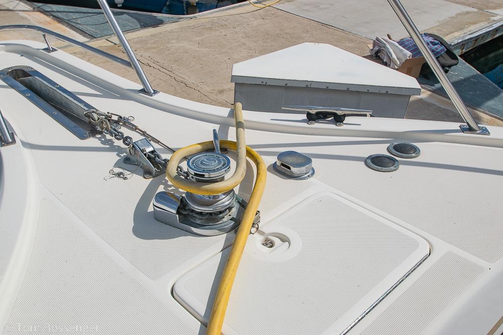 Deck of 1993 Tiara Yachts 4300 Convertible with winch and hose.
