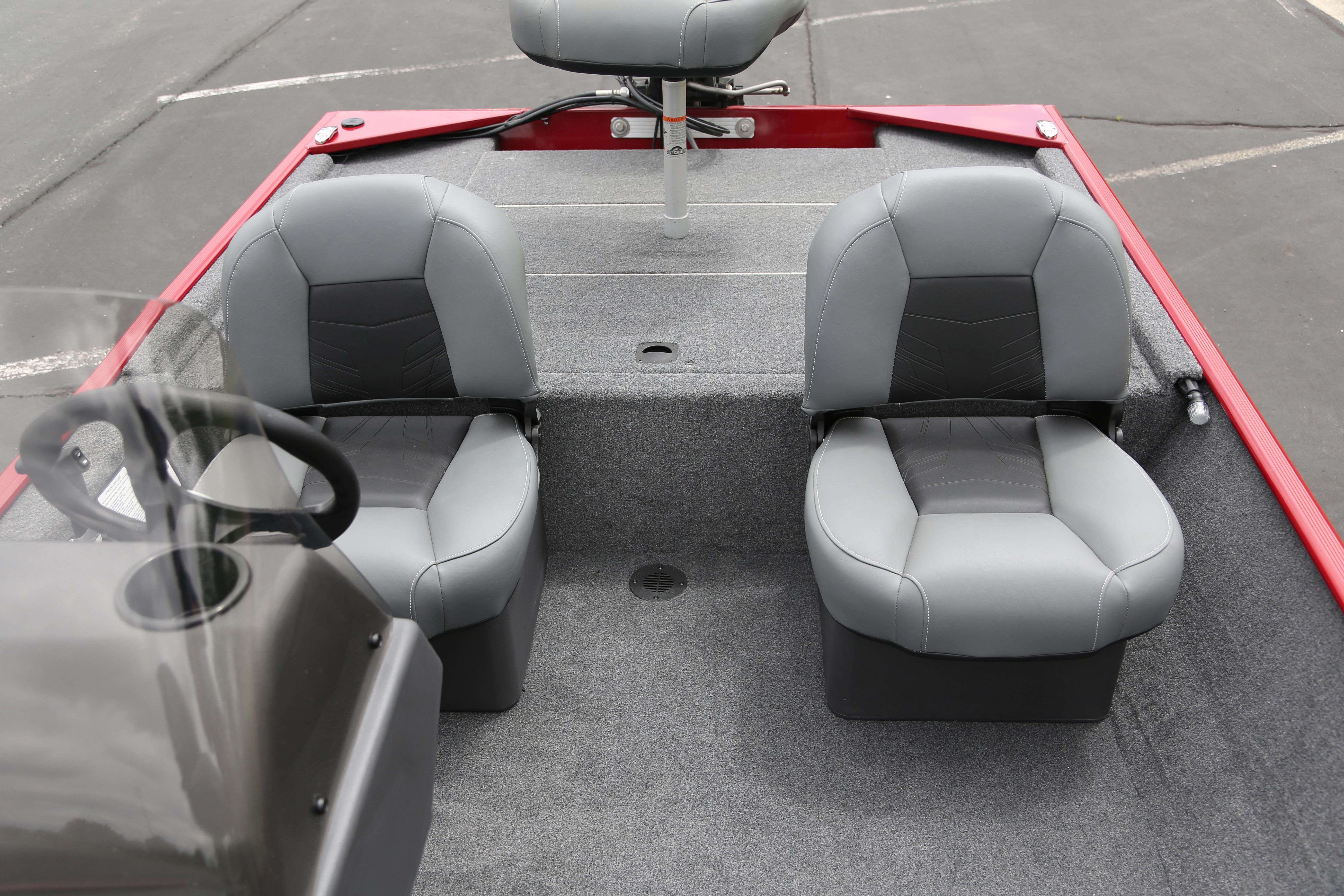 2026 Tracker Bass Tracker Classic XL boat interior with gray seating and steering console.