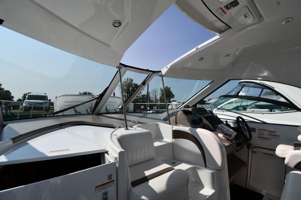 2010 Cruisers Yachts 390 Sports Coupe interior with sleek design and modern controls.