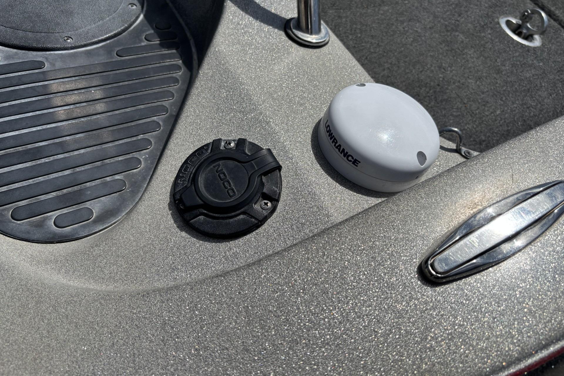 2011 Ranger 620 VS boat deck with NOCO cap and Lowrance device.