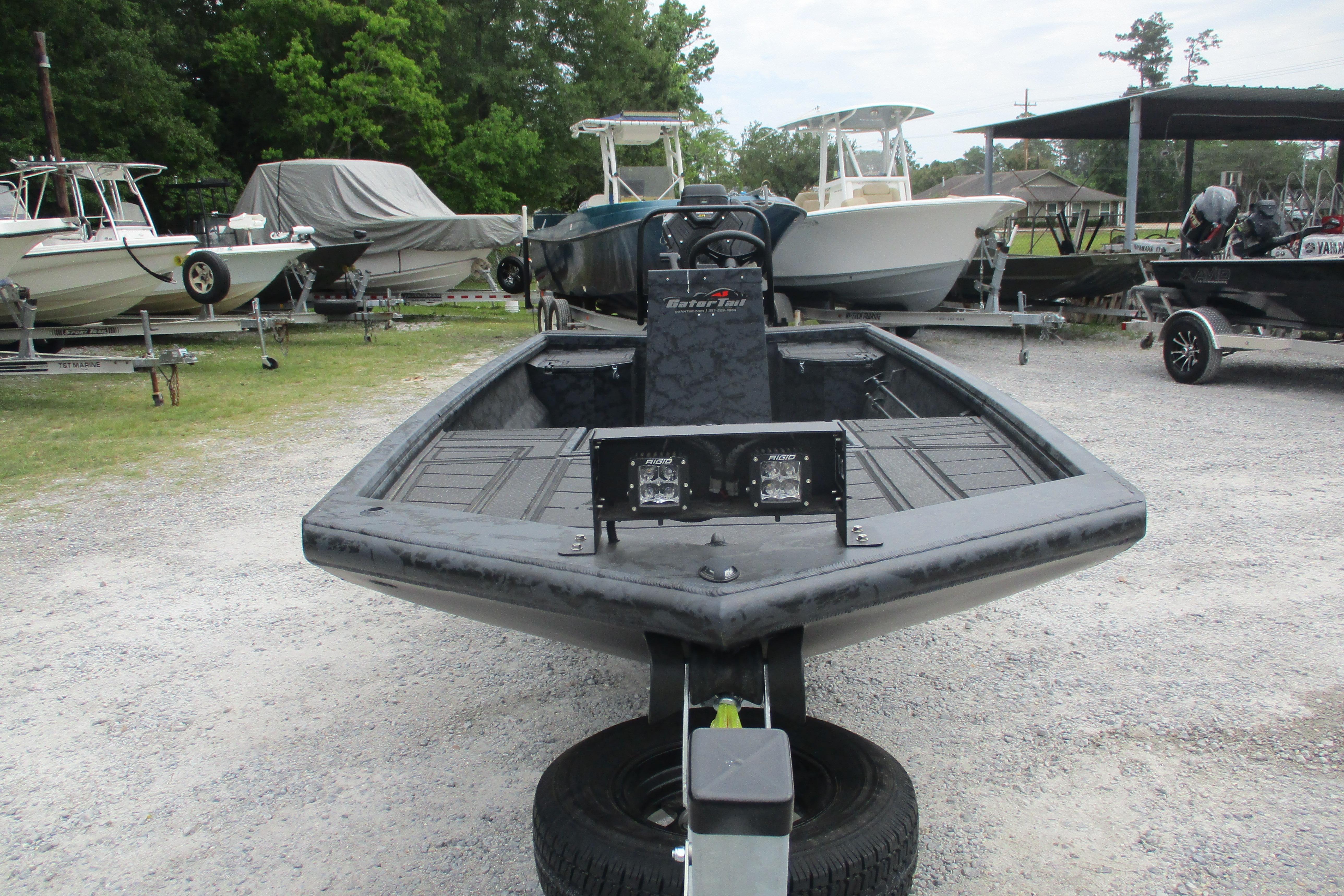 2026 Gator Tail 1860 Extreme CC boat on trailer, surrounded by other boats.