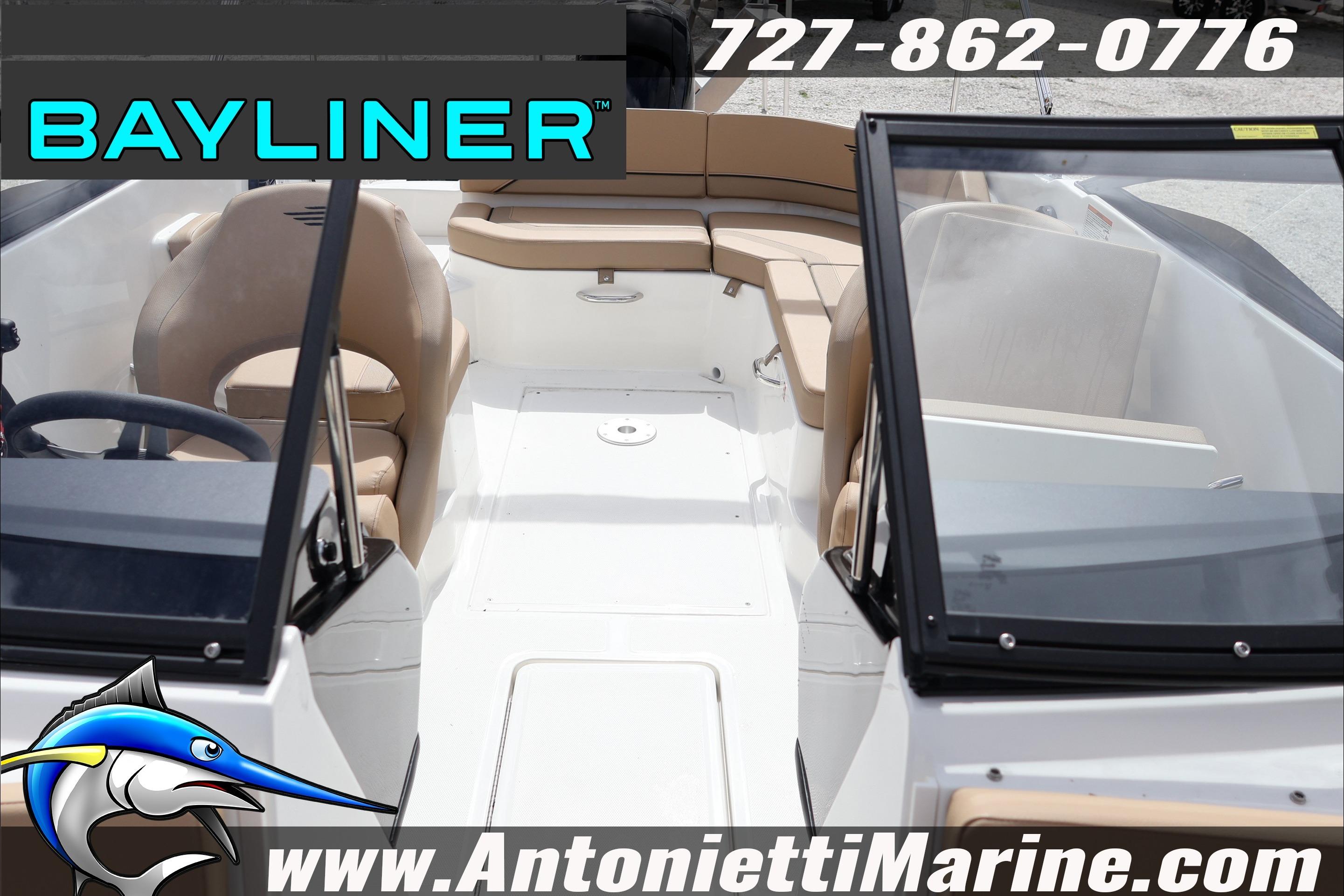 2026 Bayliner V20 boat interior with seating, steering wheel, and windshield, displayed by Antonietti Marine.