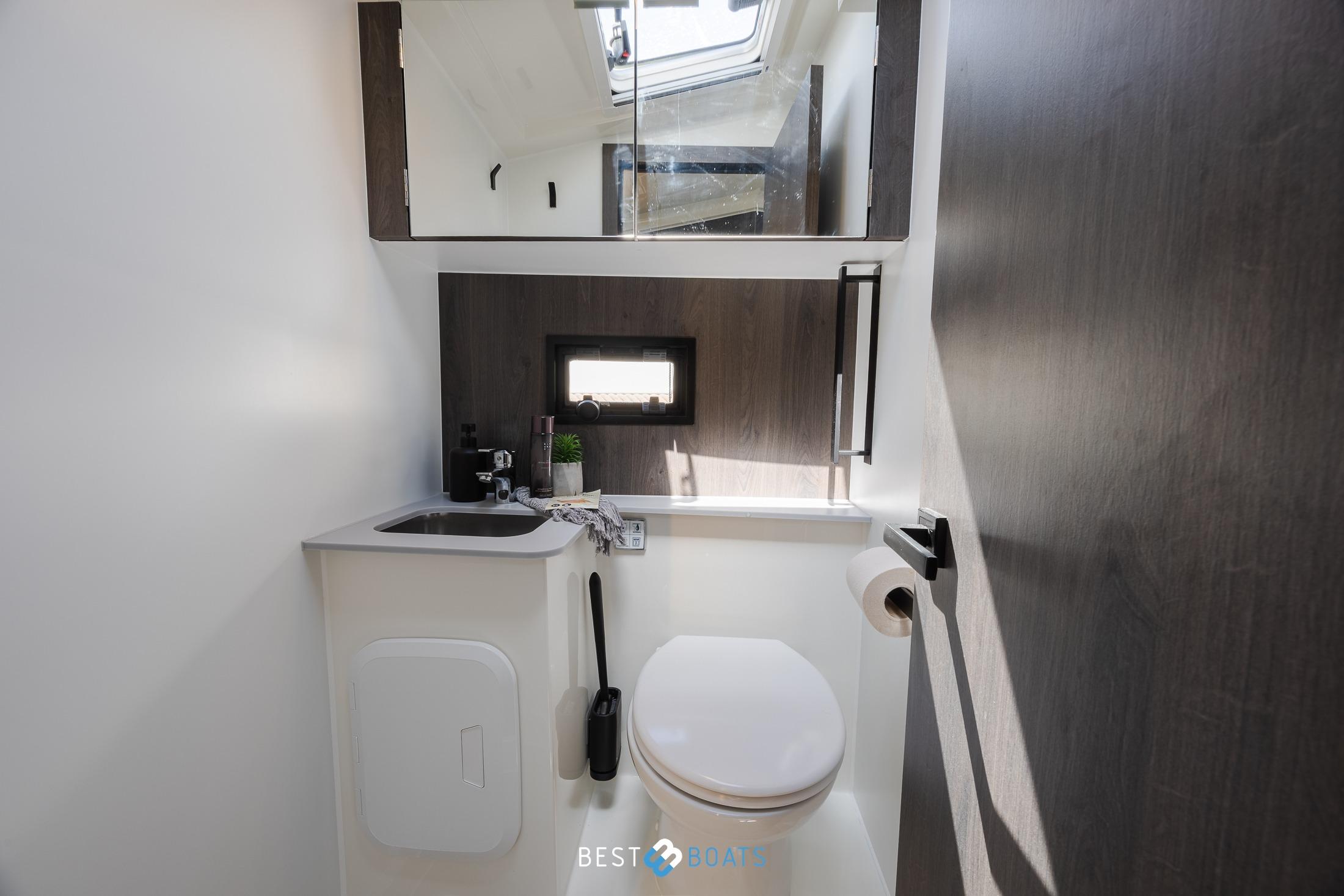 Modern bathroom in 2023 Cobra Yachts Futura 36 Premium Fly, featuring sleek design and amenities.