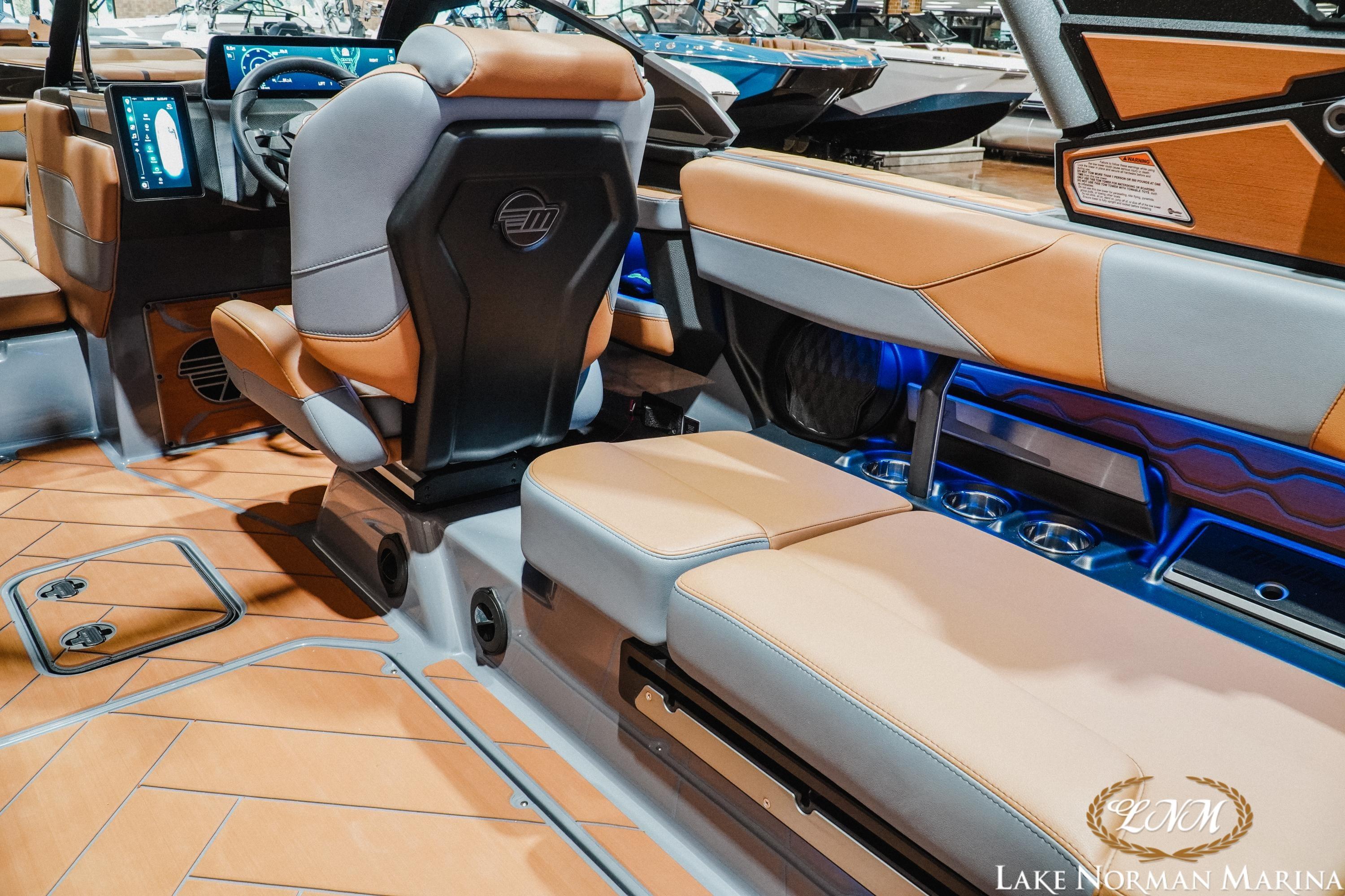 Interior of 2026 Malibu Wakesetter 23 LSV boat with luxurious seating and modern dashboard.