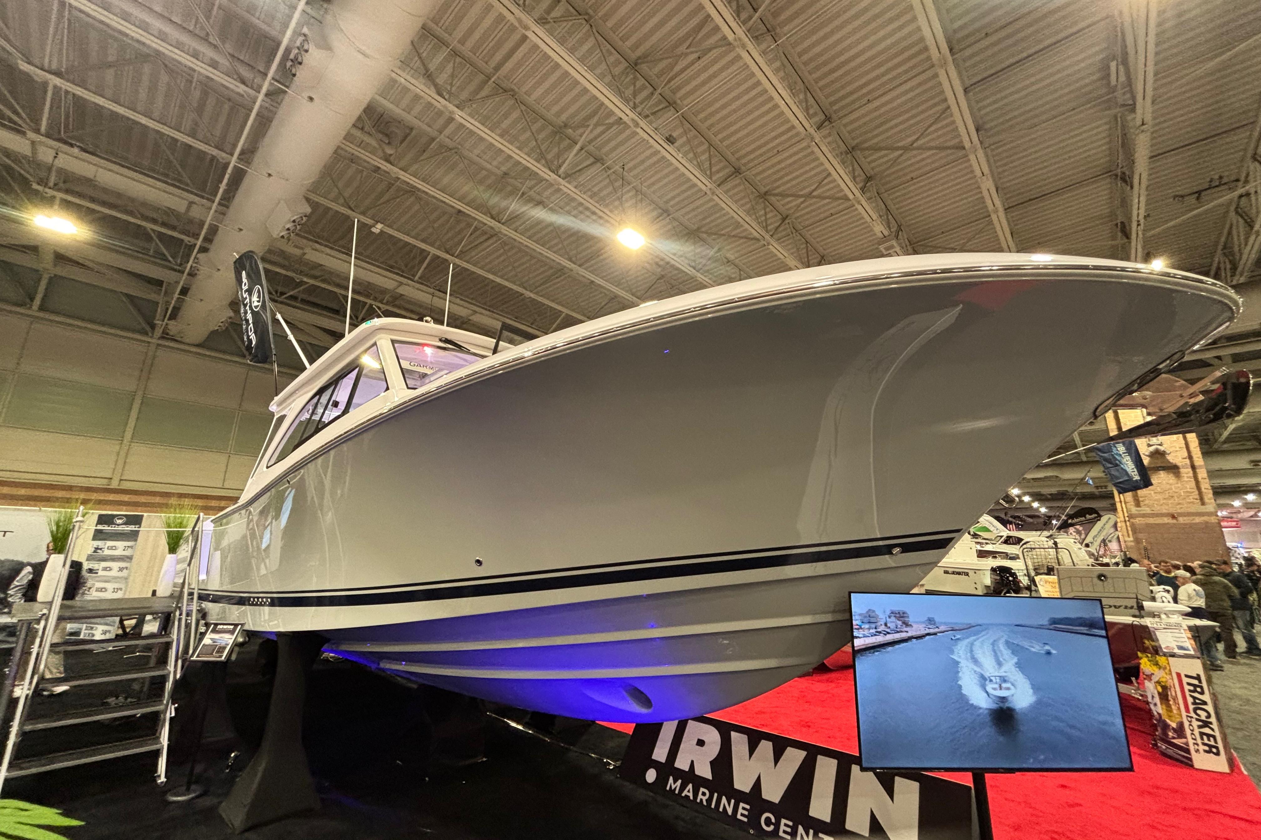 2026 Southport 33 DC boat displayed at a marine exhibition indoors.