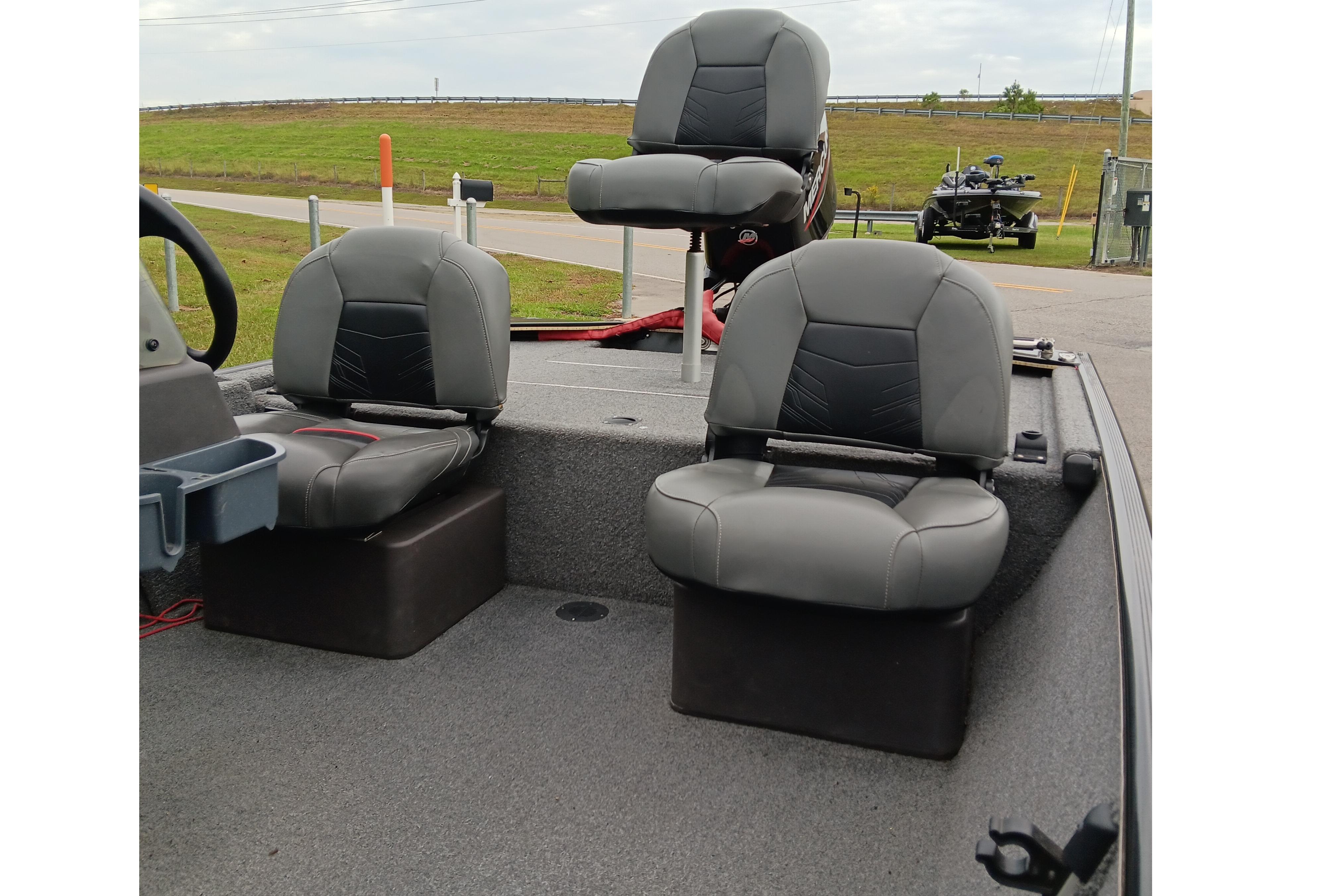 2023 Tracker Bass Tracker Classic XL boat interior with three gray seats.