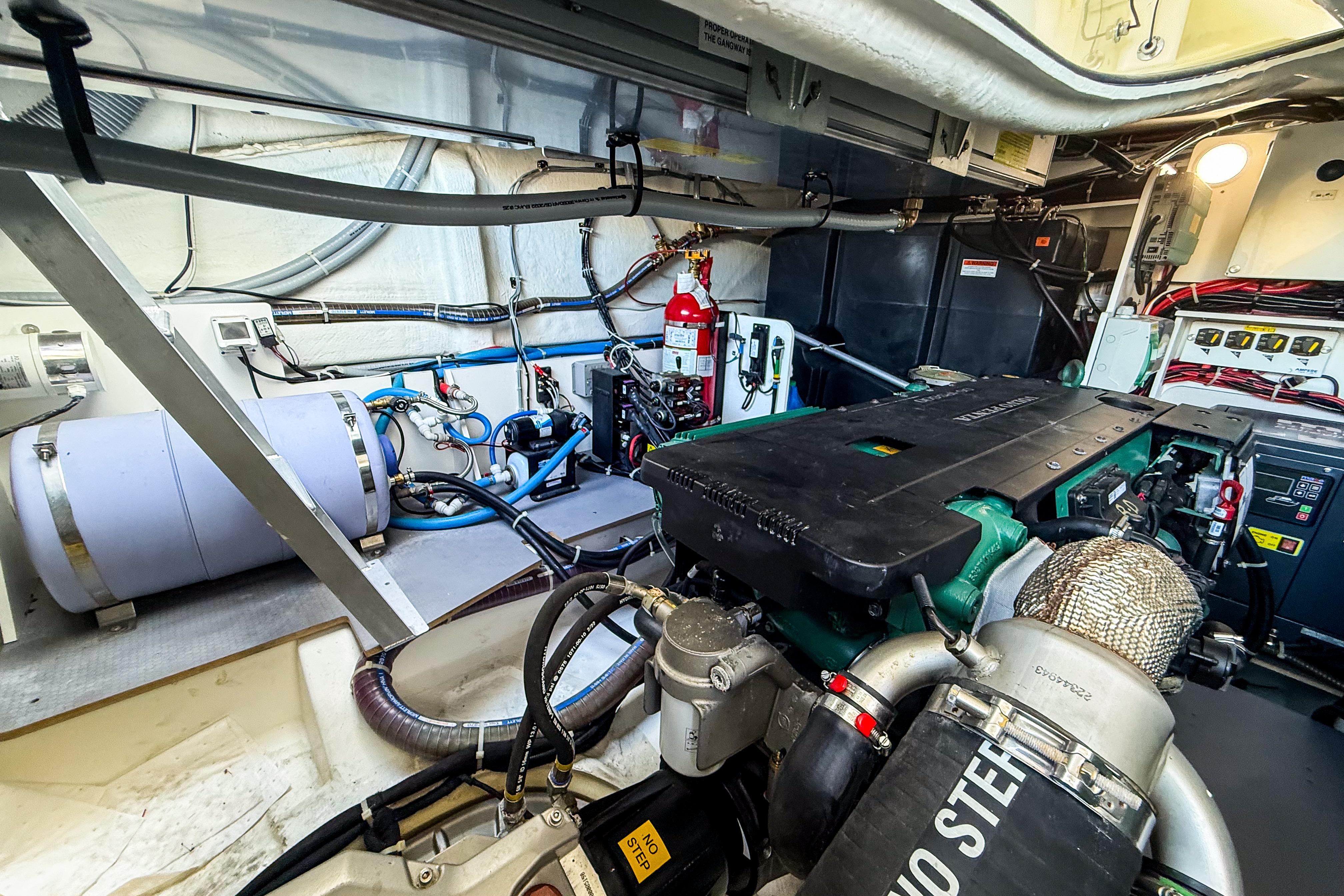 Engine room of 2023 Beneteau Gran Turismo 45 yacht, showcasing advanced machinery and equipment.
