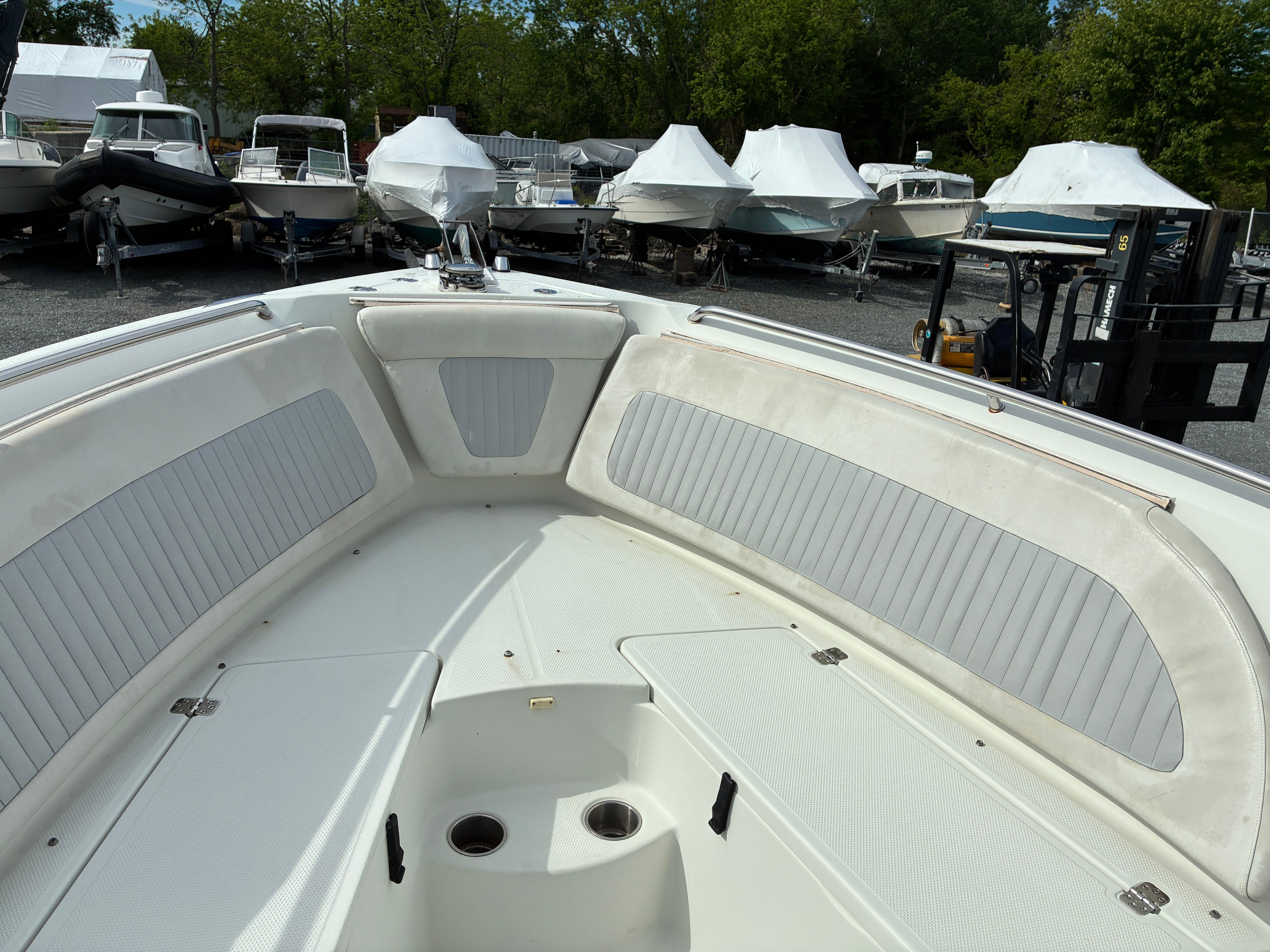 Interior view of a 2007 Sailfish 2660 boat in the marina.