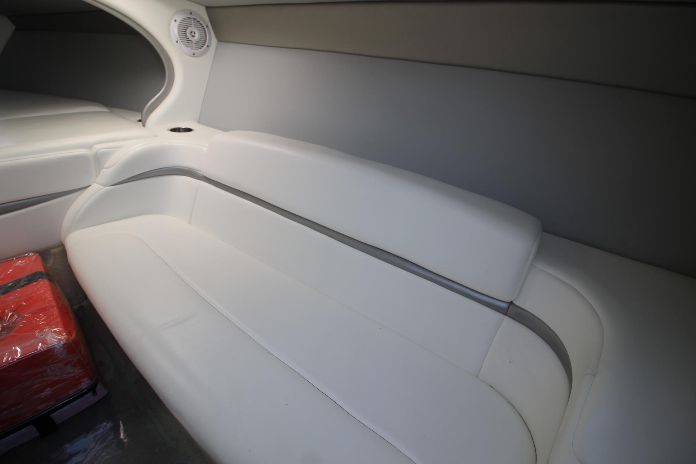 2006 Formula 292 FASTech interior with white seating and speaker detail.