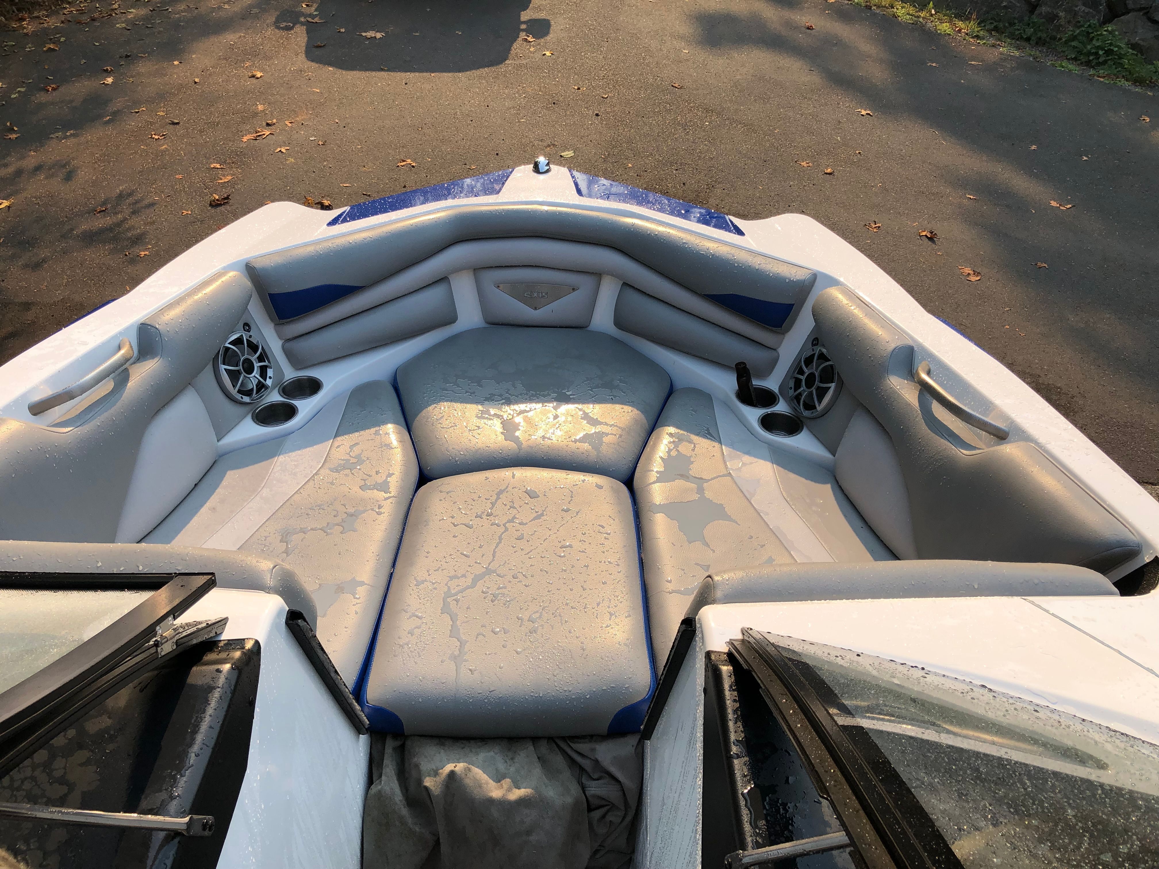 Interior of a Custom a22 boat, 2015 model, with gray upholstery.