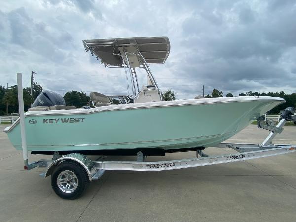 2024 Key West 203 FS boat on a trailer, side view.