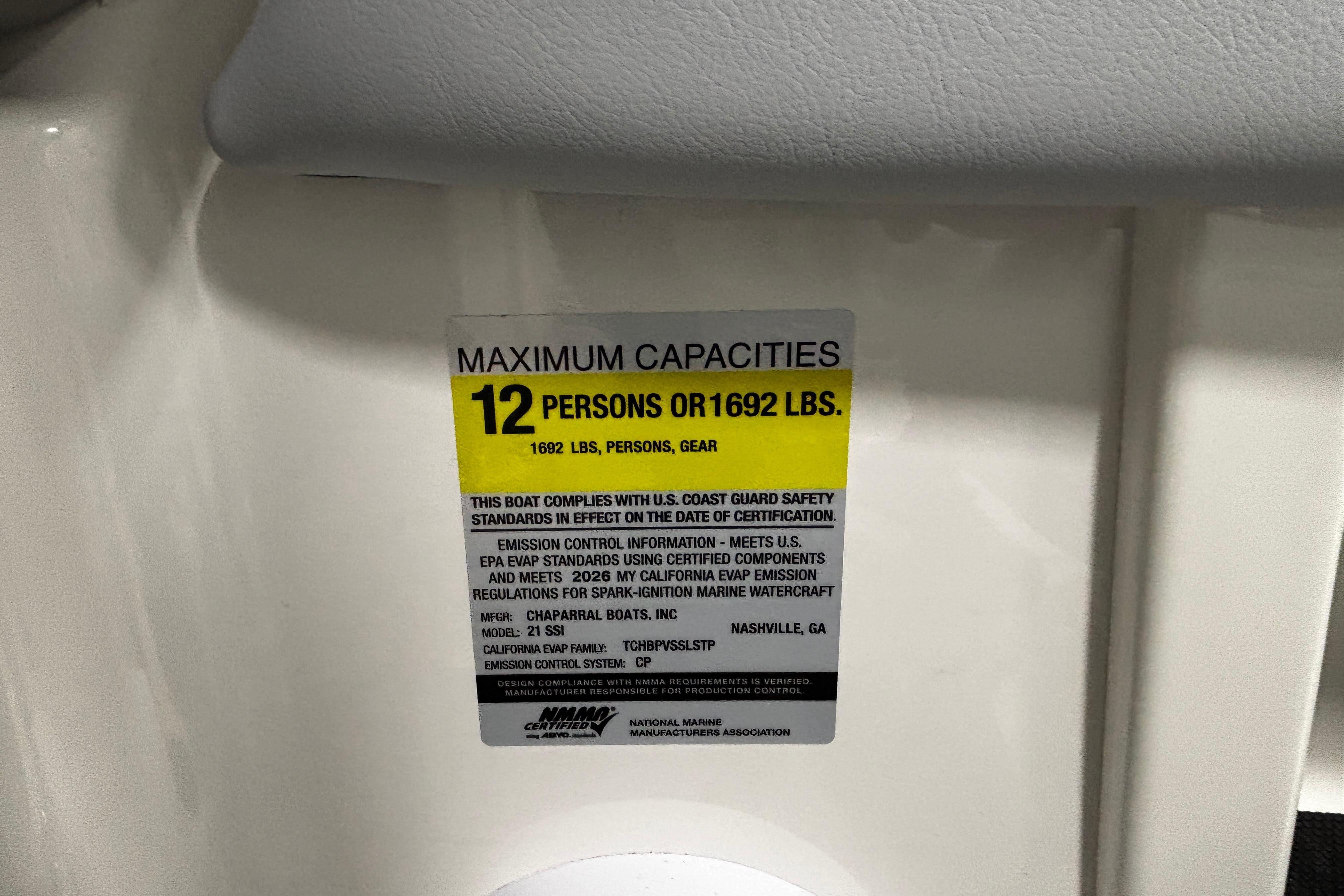 2026 Chaparral 21 SSi capacity label: 12 persons or 1692 lbs maximum.