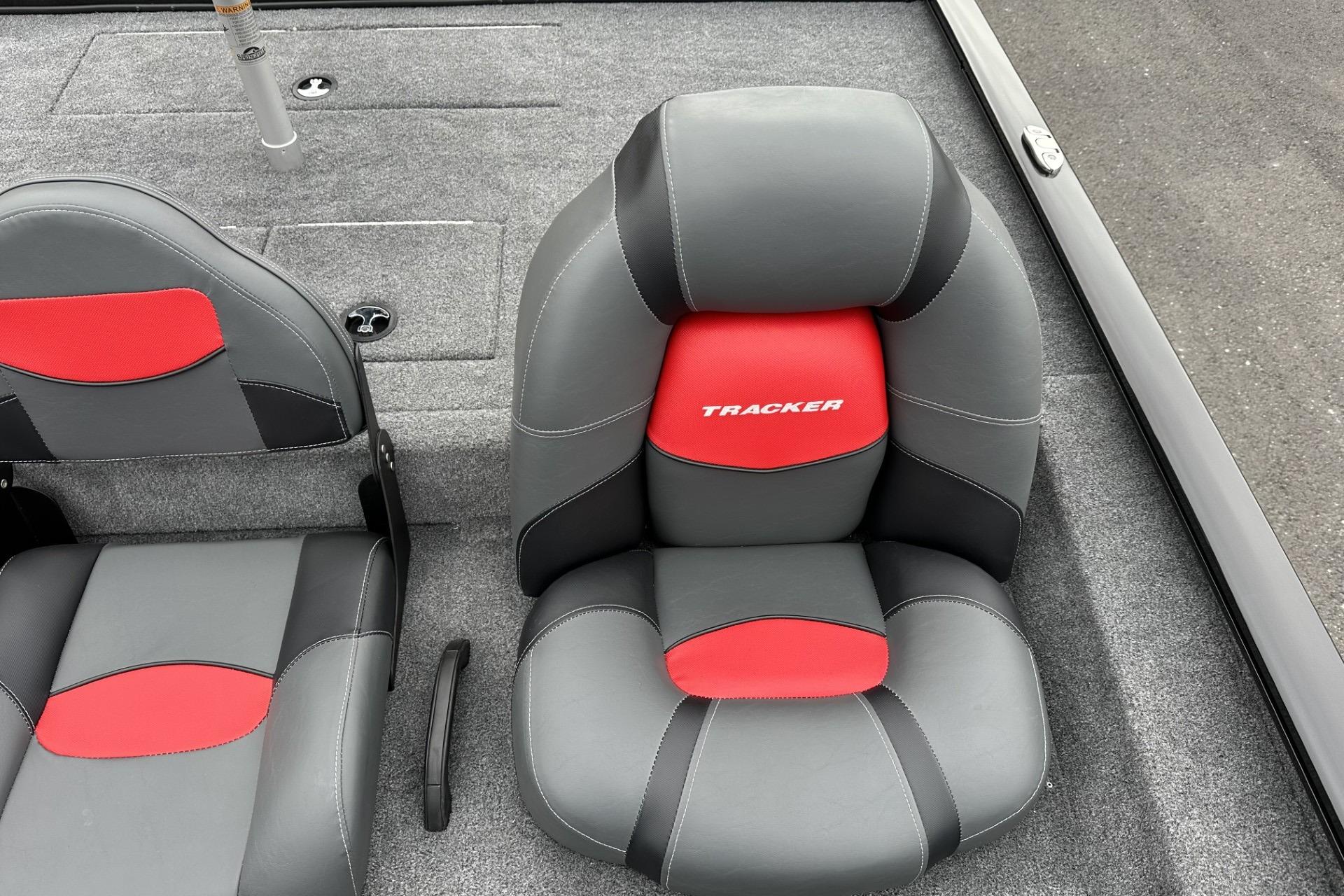 Gray and red seats in a 2025 Tracker Savage 215 boat.