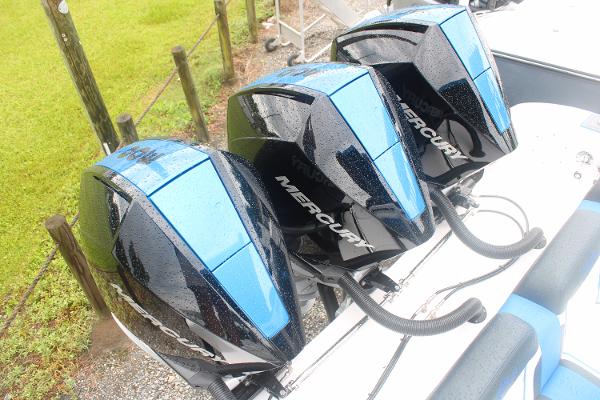 Three Mercury outboard engines on a 2024 Fountain 34 SC boat.